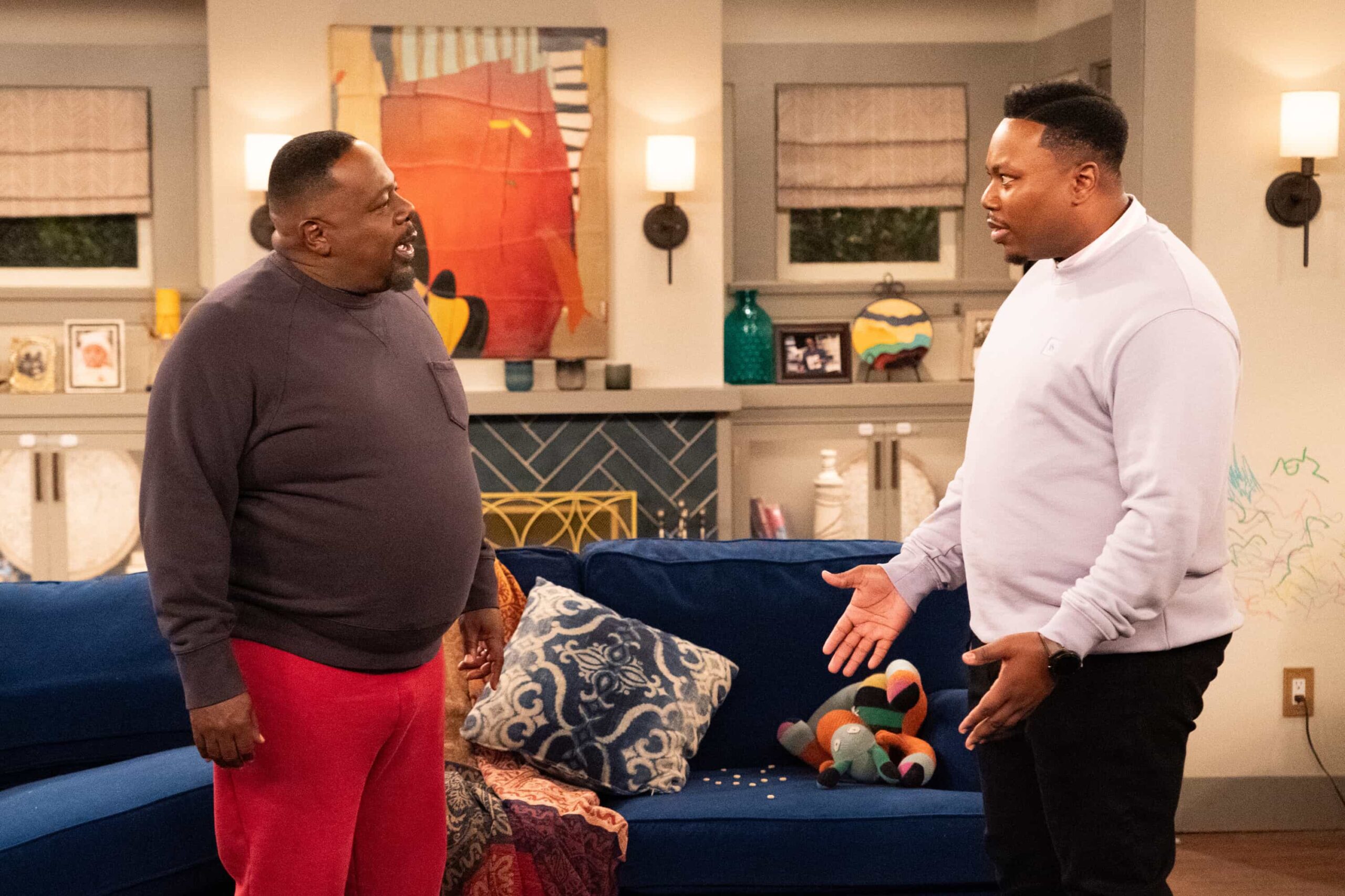 The Neighborhood Season 8 Episode 11 “Welcome to the Baby Proofing” – While Marty heads to San Diego for a tech convention and Courtney is away for the weekend, Tina’s insistence on babysitting Daphne sparks a baby-proofing fiasco that leaves Calvin and Dave unexpectedly locked inside the bathroom, on THE NEIGHBORHOOD, Pictured: Cedric The Entertainer as Calvin and Marcel Spears as Marty. Photo: Monty Brinton/CBS ©2025 CBS Broadcasting, Inc. All Rights Reserved.