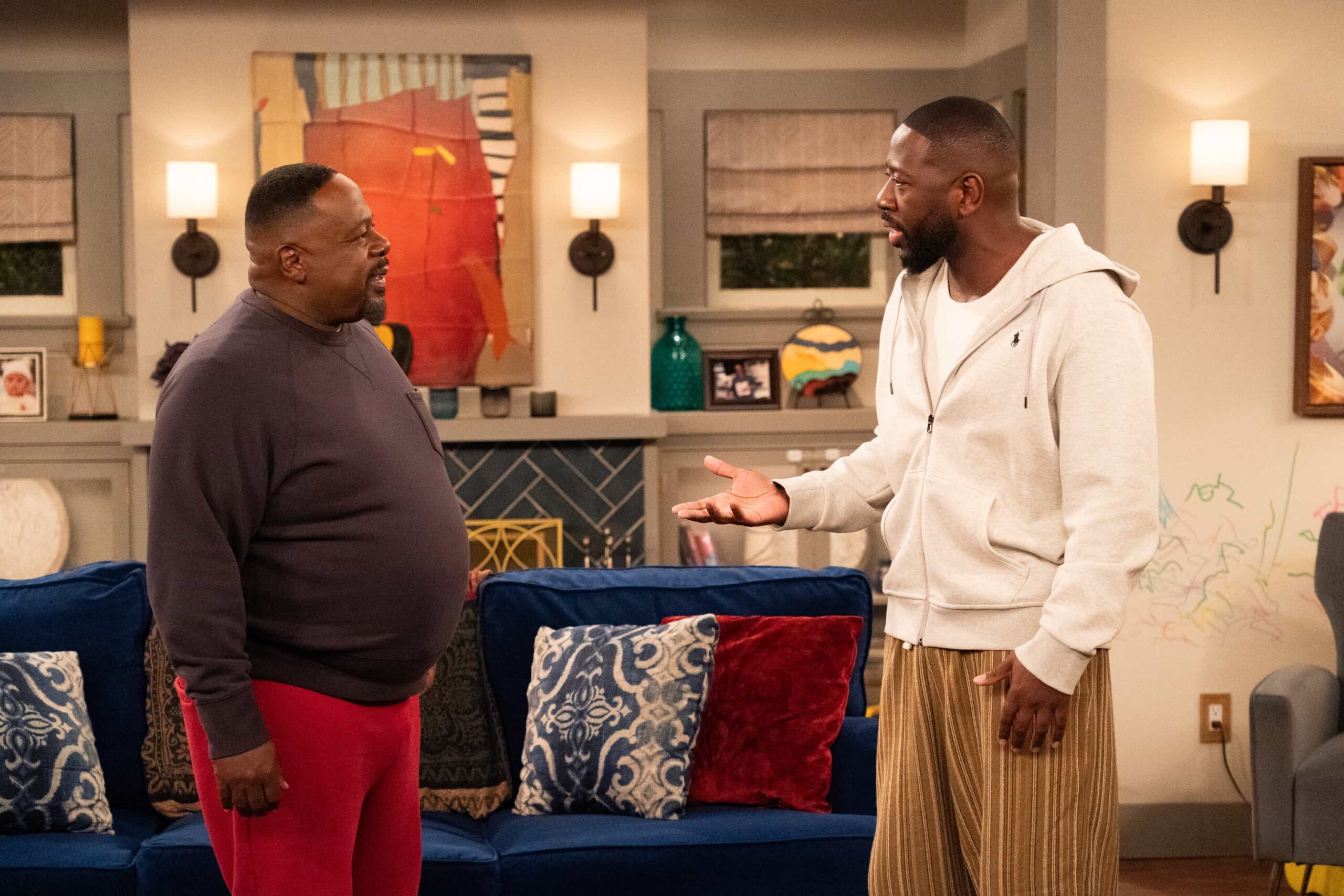 The Neighborhood Season 8 Episode 11 “Welcome to the Baby Proofing” – While Marty heads to San Diego for a tech convention and Courtney is away for the weekend, Tina’s insistence on babysitting Daphne sparks a baby-proofing fiasco that leaves Calvin and Dave unexpectedly locked inside the bathroom, on THE NEIGHBORHOOD, Pictured: Cedric The Entertainer as Calvin and Sheaun McKinney as Malcolm. Photo: Monty Brinton/CBS ©2025 CBS Broadcasting, Inc. All Rights Reserved.