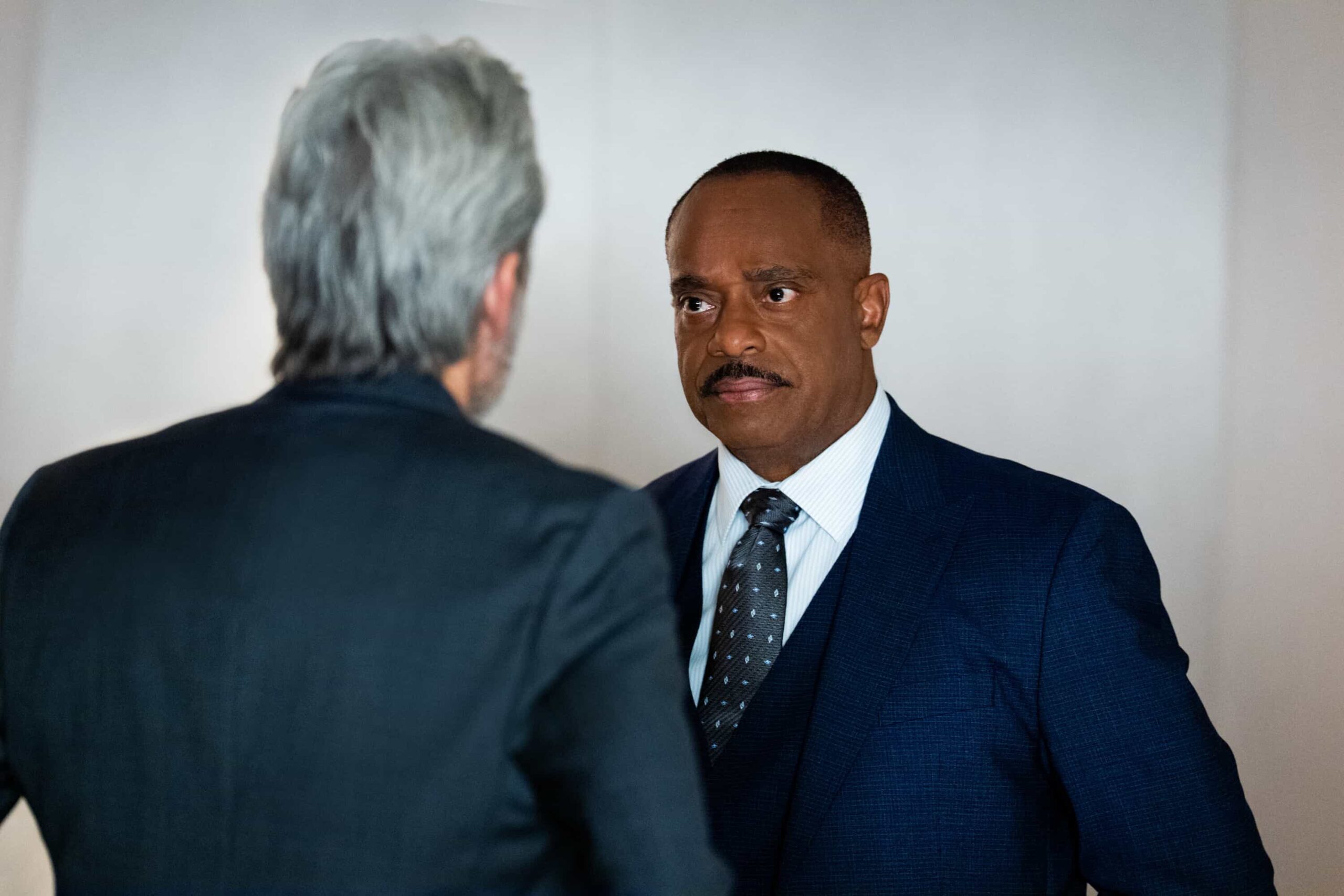 NCIS Season 23 Episode 11 Picture “Army of One” – When a desperate man barricades himself inside an ammo warehouse, Knight is the only negotiator he’ll talk to, claiming she once saved him before. As explosives tick and trust frays, Knight clashes with the CID officer running the standoff, each convinced theirs is the only way out, on the CBS Original series NCIS, Tuesday, March 10 (8:00-9:00 PM, ET/PT) on the CBS Television Network, and streaming on Paramount+     Pictured (L-R): Gary Cole as Special Agent Alden Parker and  Rocky Carroll as NCIS Director Leon Vance   Photo: Robert Voets/CBS ©2025 CBS Broadcasting, Inc. All Rights Reserved.