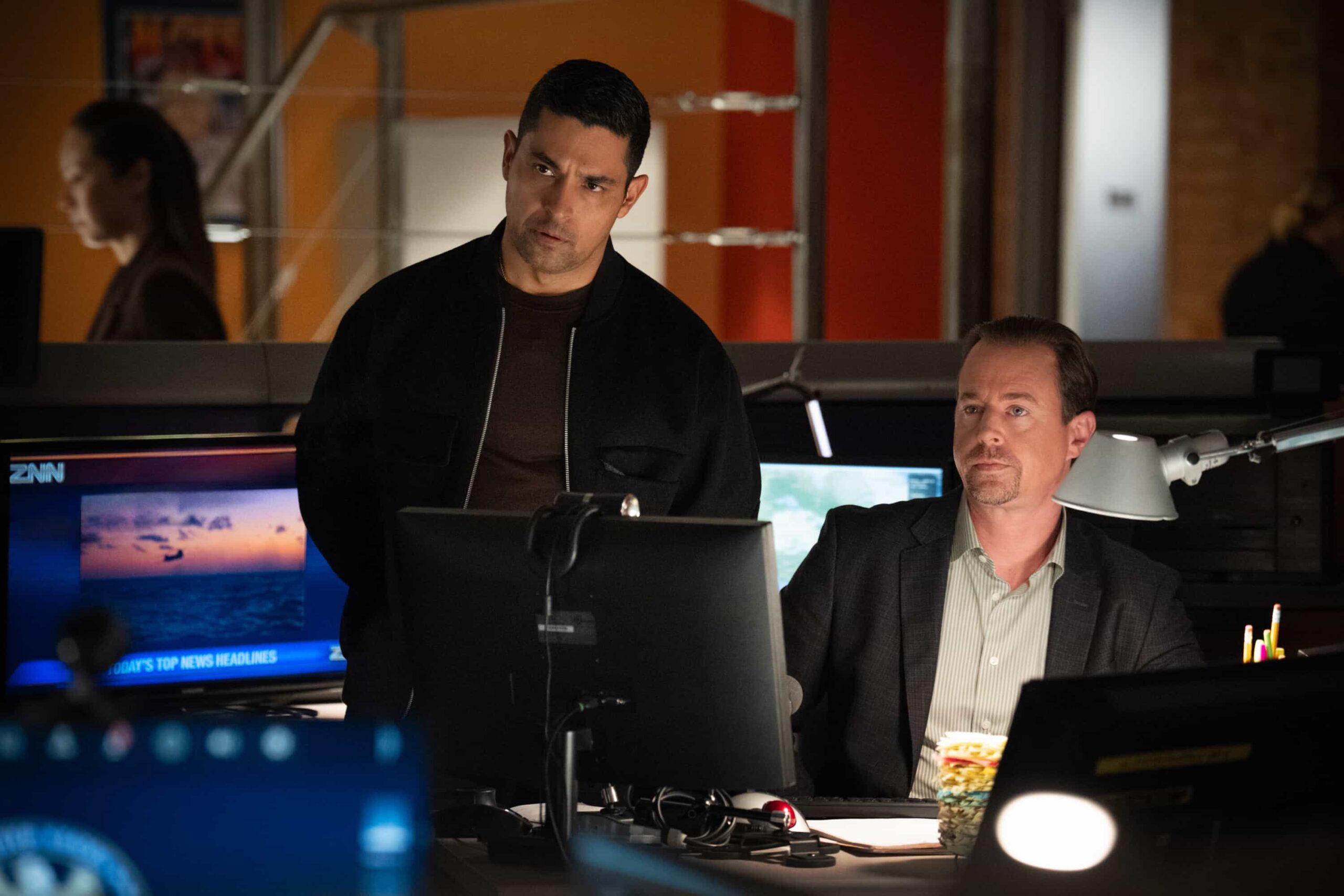 NCIS Season 23 Episode 11 “Army of One” – When a desperate man barricades himself inside an ammo warehouse, Knight is the only negotiator he’ll talk to, claiming she once saved him before. As explosives tick and trust frays, Knight clashes with the CID officer running the standoff, each convinced theirs is the only way out, on the CBS Original series NCIS, Tuesday, March 10 (8:00-9:00 PM, ET/PT) on the CBS Television Network, and streaming on Paramount+   Pictured (L-R): Wilmer Valderrama as Special Agent Nicholas “Nick” Torres and Sean Murray as Special Agent Timothy McGee  Photo: Robert Voets/CBS ©2025 CBS Broadcasting, Inc. All Rights Reserved.