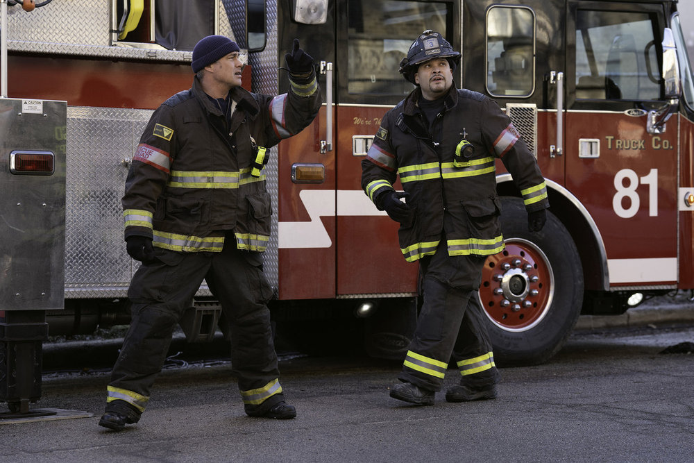 CHICAGO FIRE Season 14 Episode 14 Promo -- "Hit and Run" Episode 1414 -- Pictured: (l-r) Taylor Kinney as Kelly Severide, Joe Miñoso as Joe Cruz -- (Photo by: Peter Gordon/NBC)