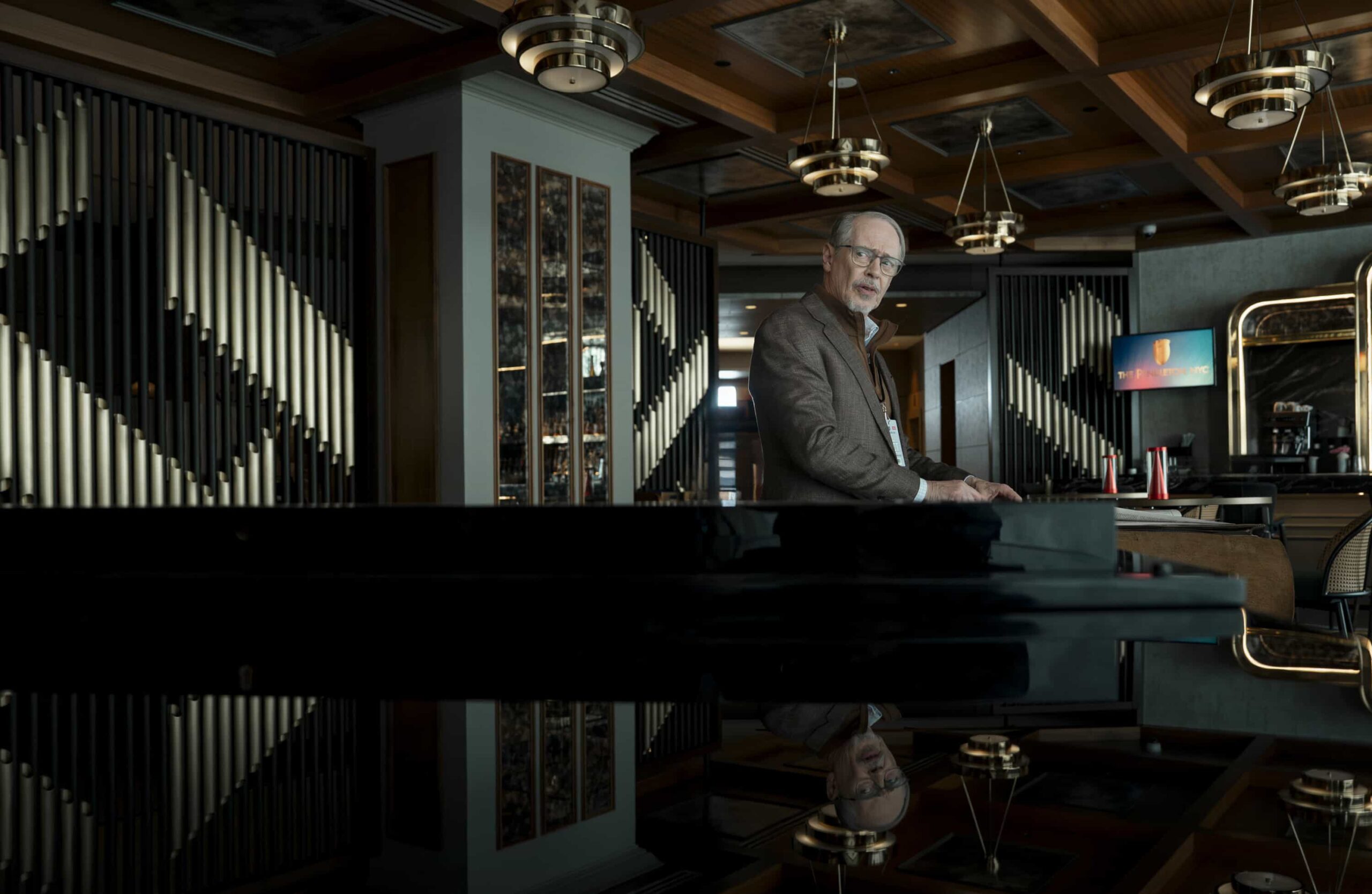 Elsbeth Season 3 Episode 13 Photo “Murder Six Across” – After the famed editor of the daily puzzle is murdered at the annual crossword championship, Elsbeth infiltrates the world of elite puzzle solvers to find the champion who will do whatever it takes to win, on ELSBETH, Thursday, March 12 (10:00-11:00 PM, ET/PT) on the CBS Television Network, and streaming on Paramount+   Pictured: Steve Buscemi as Simon Craigie     Photo: Michael Parmelee/CBS ©2025 CBS Broadcasting, Inc. All Rights Reserved.