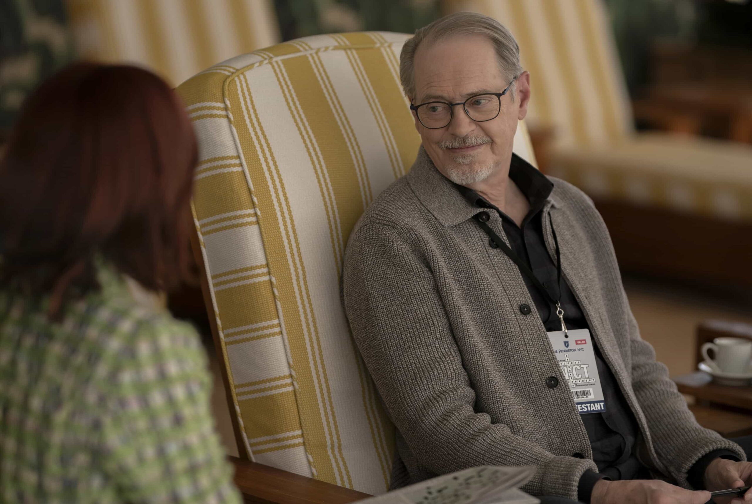 Elsbeth Season 3 Episode 13 “Murder Six Across” – After the famed editor of the daily puzzle is murdered at the annual crossword championship, Elsbeth infiltrates the world of elite puzzle solvers to find the champion who will do whatever it takes to win, on ELSBETH, Thursday, March 12 (10:00-11:00 PM, ET/PT) on the CBS Television Network, and streaming on Paramount+  Pictured (L-R): Carrie Preston as Elsbeth Tascioni and Steve Buscemi as Simon Craigie     Photo: Michael Parmelee/CBS ©2025 CBS Broadcasting, Inc. All Rights Reserved.