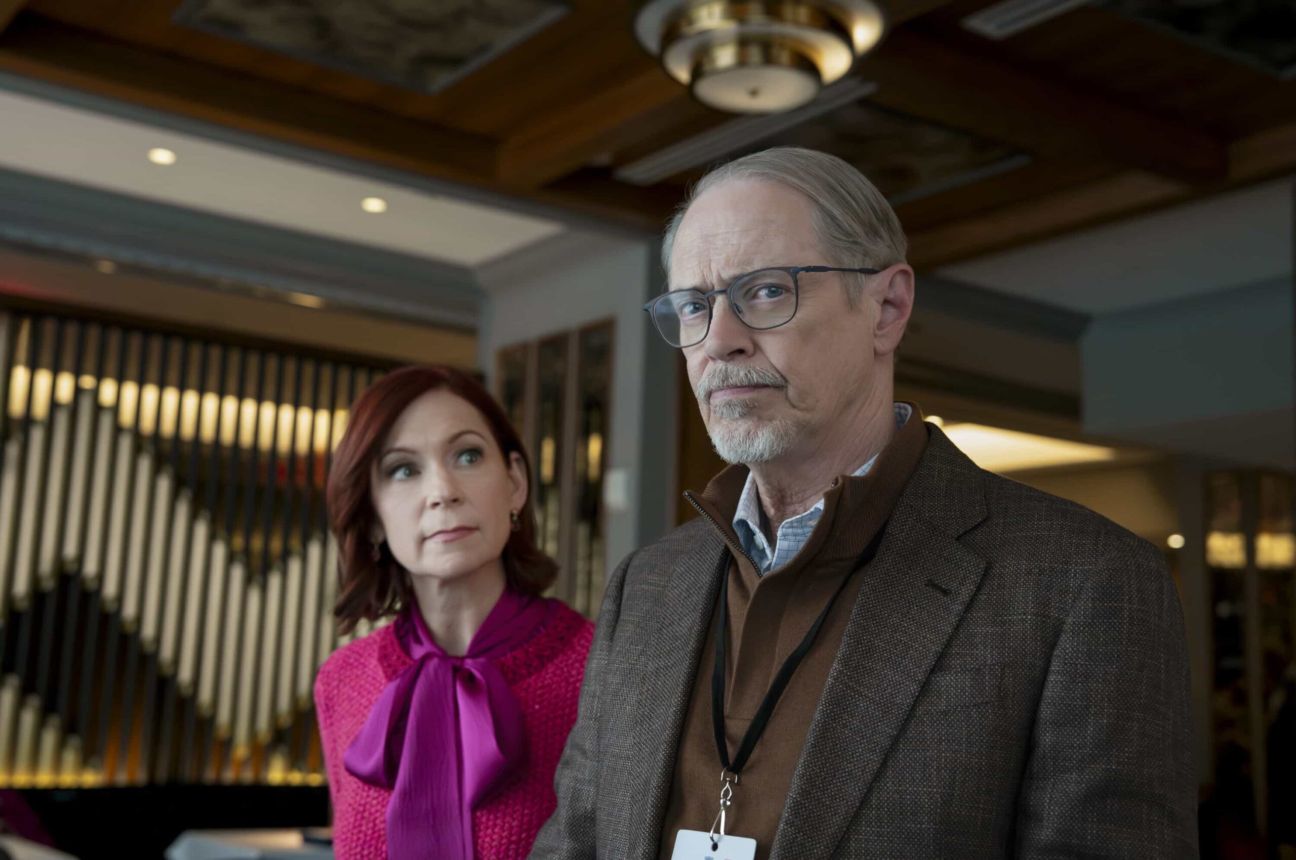 Elsbeth Season 3 Episode 13 Picture “Murder Six Across” – After the famed editor of the daily puzzle is murdered at the annual crossword championship, Elsbeth infiltrates the world of elite puzzle solvers to find the champion who will do whatever it takes to win, on ELSBETH, Thursday, March 12 (10:00-11:00 PM, ET/PT) on the CBS Television Network, and streaming on Paramount+   Pictured (L-R): Carrie Preston as Elsbeth Tascioni and Steve Buscemi as Simon Craigie     Photo: Michael Parmelee/CBS ©2025 CBS Broadcasting, Inc. All Rights Reserved.