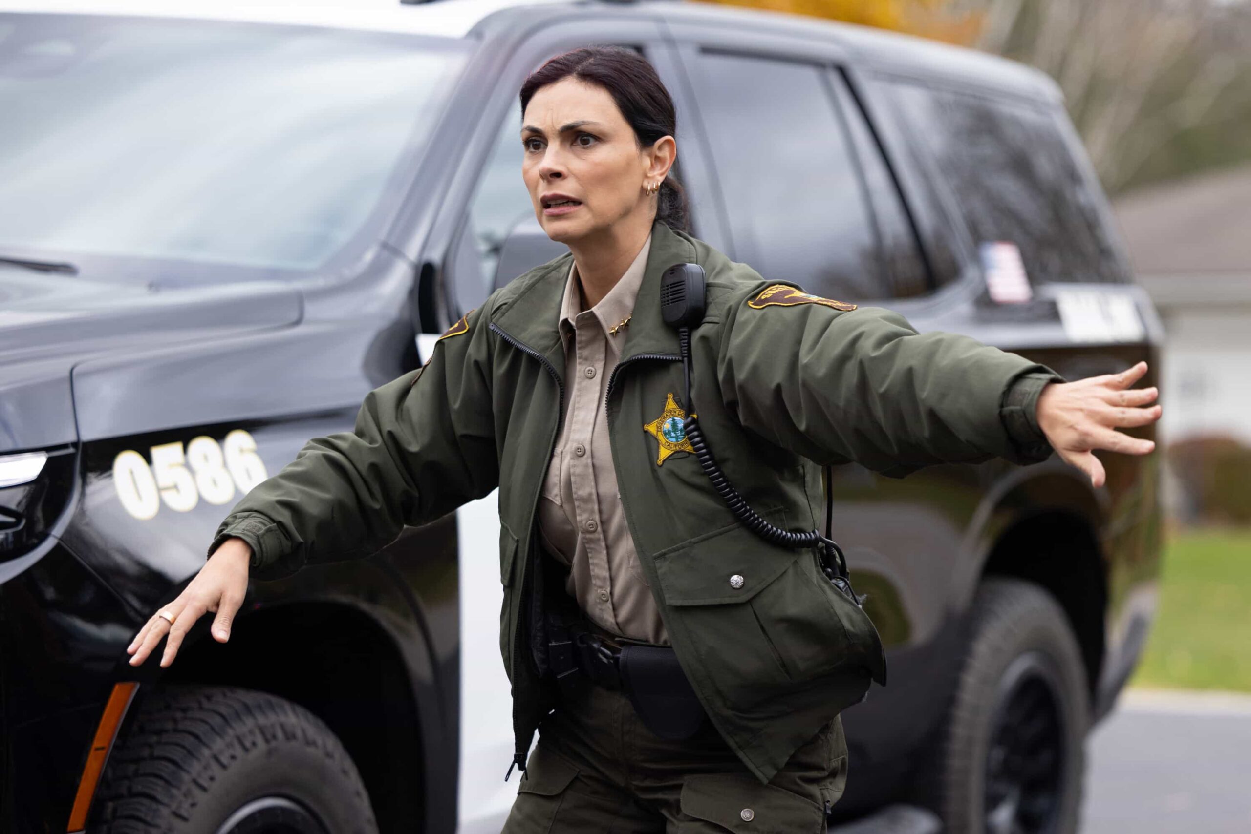 "Plus One" -- Coverage of the CBS Original Series SHERIFF COUNTRY, scheduled to air on the CBS Television Network.  Pictured: Morena Baccarin as Sheriff Mickey Fox. Photo: Darren Goldstein/CBS ©2025 CBS Broadcasting, Inc. All Rights Reserved.