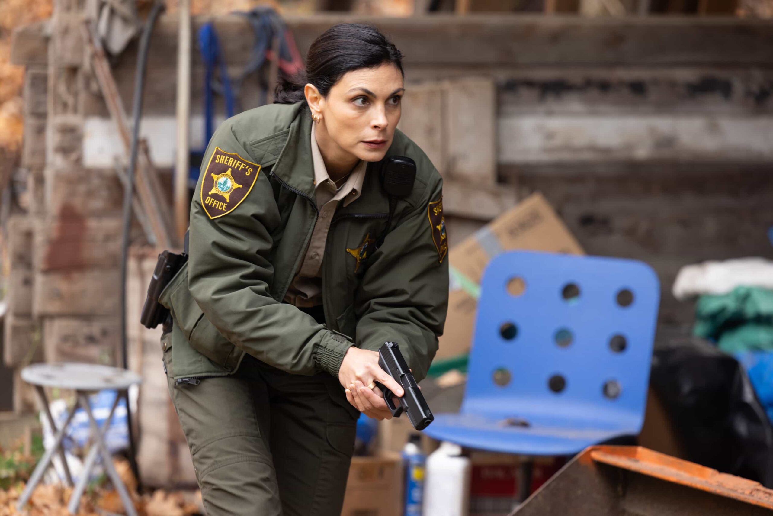"Plus One" -- Coverage of the CBS Original Series SHERIFF COUNTRY, scheduled to air on the CBS Television Network.  Pictured: Morena Baccarin as Sheriff Mickey Fox. Photo: Darren Goldstein/CBS ©2025 CBS Broadcasting, Inc. All Rights Reserved.
