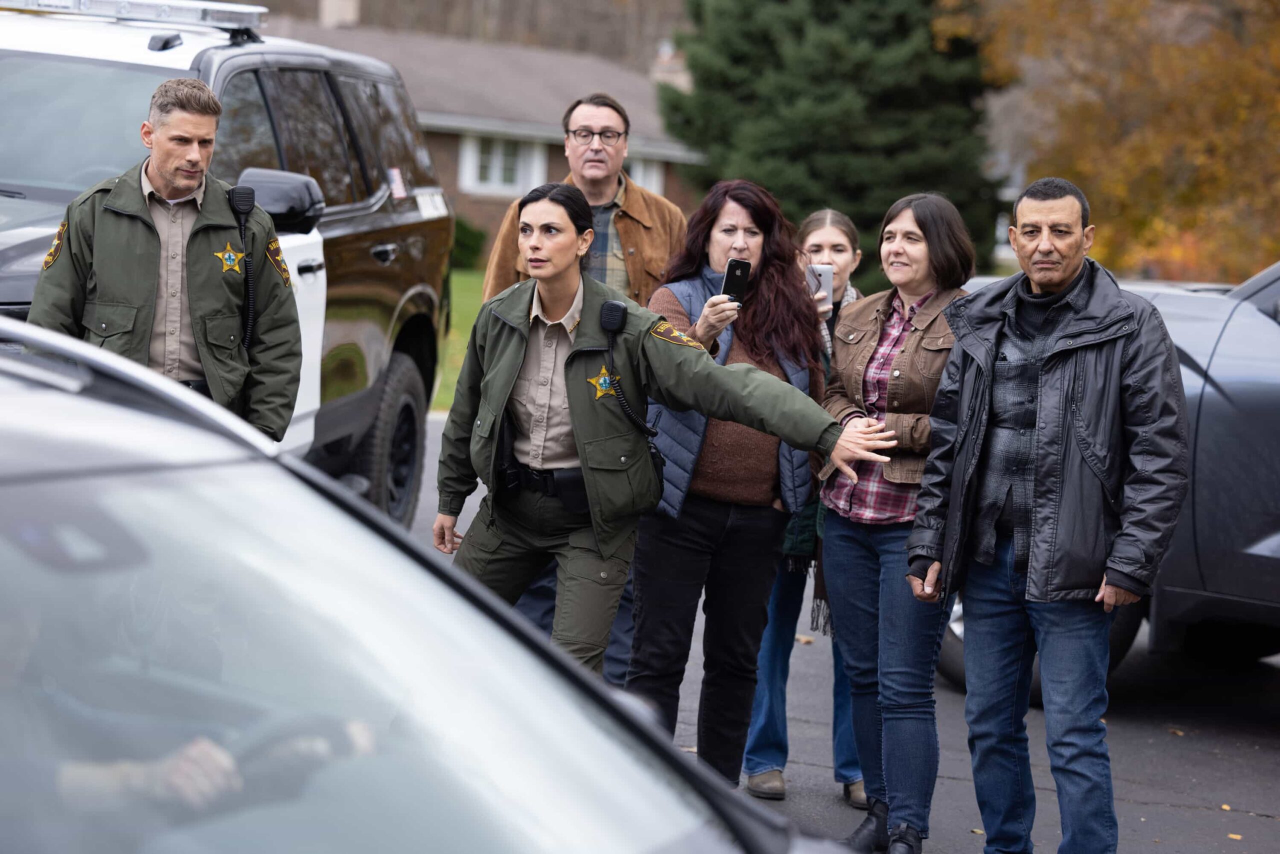 "Plus One" -- Coverage of the CBS Original Series SHERIFF COUNTRY, scheduled to air on the CBS Television Network.  Pictured: Matt Lauria as Boone and Morena Baccarin as Sheriff Mickey Fox. Photo: Darren Goldstein/CBS ©2025 CBS Broadcasting, Inc. All Rights Reserved.