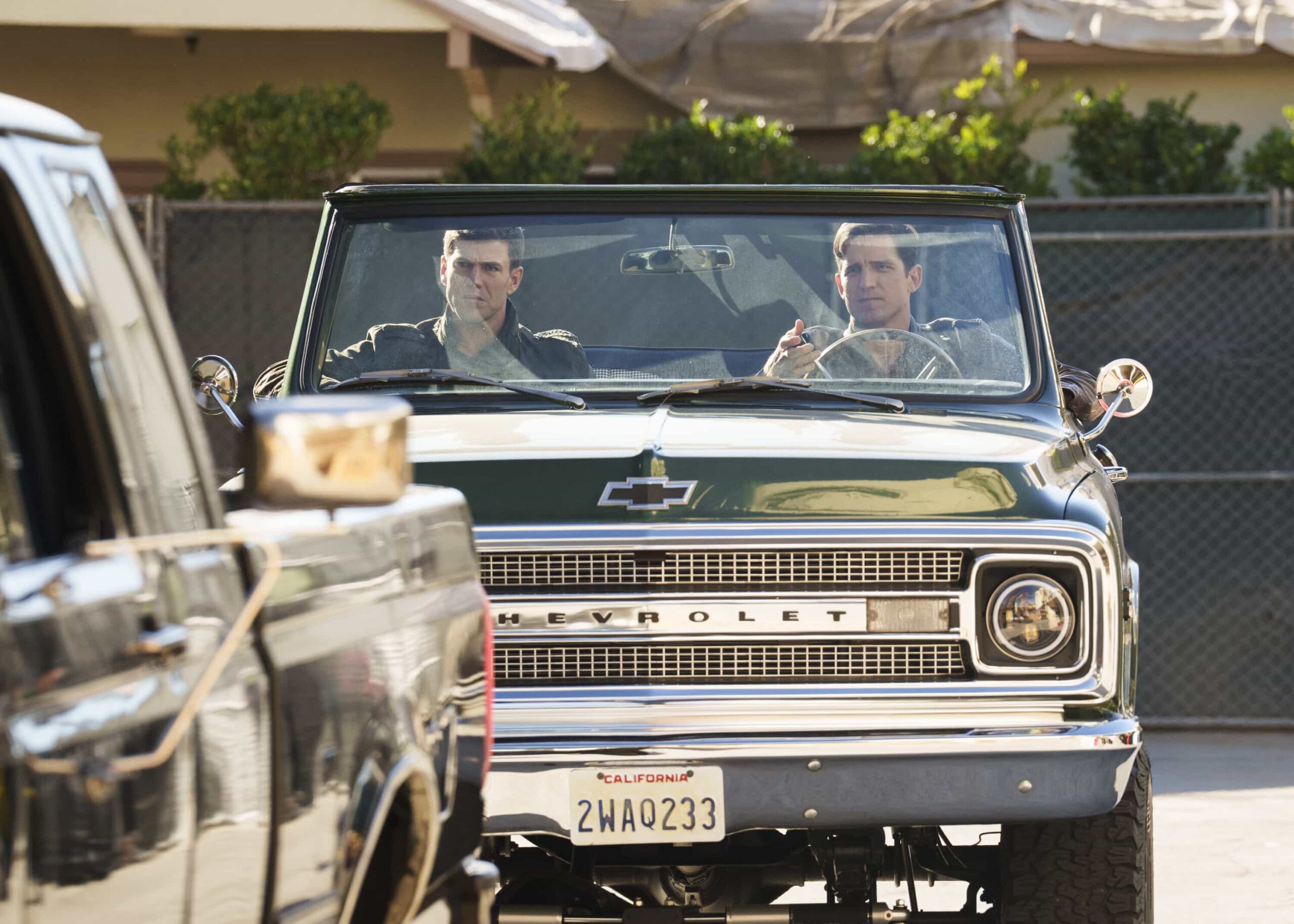 NCIS Origins Season 2 Episode 11 Promo "Feelin Alright?" -- Coverage of the CBS Original Series NCIS: ORIGINS, scheduled to air Tuesday, March 17 (9:00-10:00 PM, ET/PT).   Pictured L to R: Austin Stowell as Leroy Jethro Gibbs and Shea Buckner as NIS Special Agent Dwayne Pride  Photo: Greg Gayne/CBS ©2025 CBS Broadcasting, Inc. All Rights Reserved.