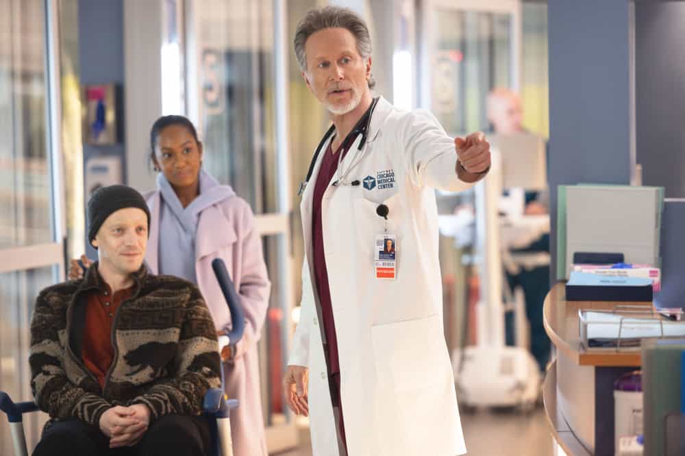 CHICAGO MED Season 11 Episode 15 Still -- "The Cost of Living" Episode 1115 -- Pictured: (l-r) Zach Appelman as Jeremy, Tetona Jackson as Esme, Steven Weber as Dr. Dean Archer -- (Photo by: George Burns Jr/NBC)