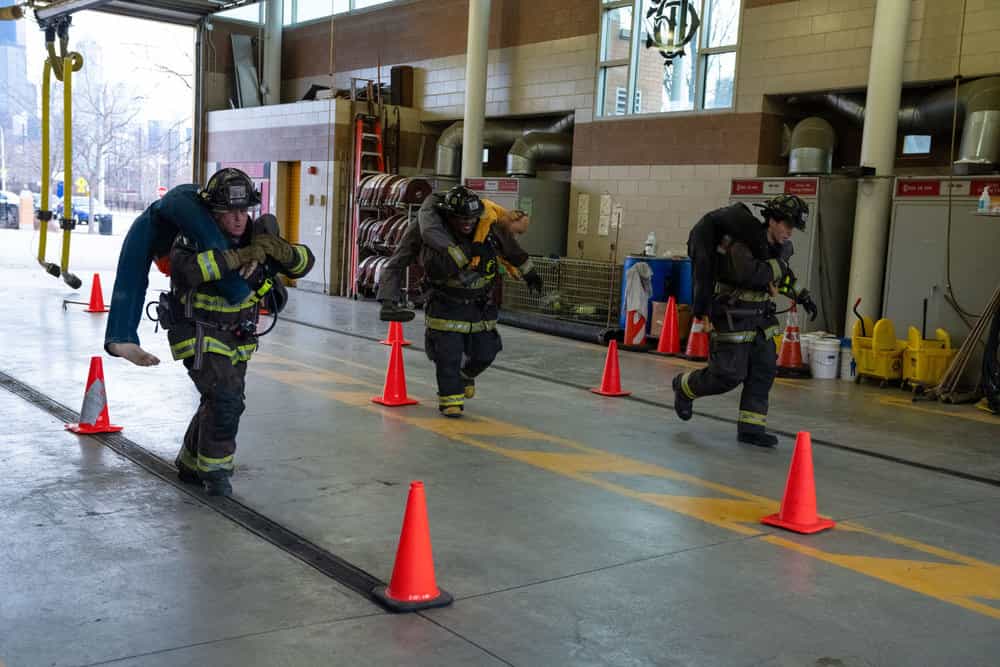 CHICAGO FIRE Season 14 Episode 15 -- "Do Not Resuscitate" Episode 1415 -- Pictured: (l-r) David Eigenberg as Christopher Herrmann, Leroy Williams III as Ballard, Brandon Larracuente as Sal Vasquez -- (Photo by: Peter Gordon/NBC)