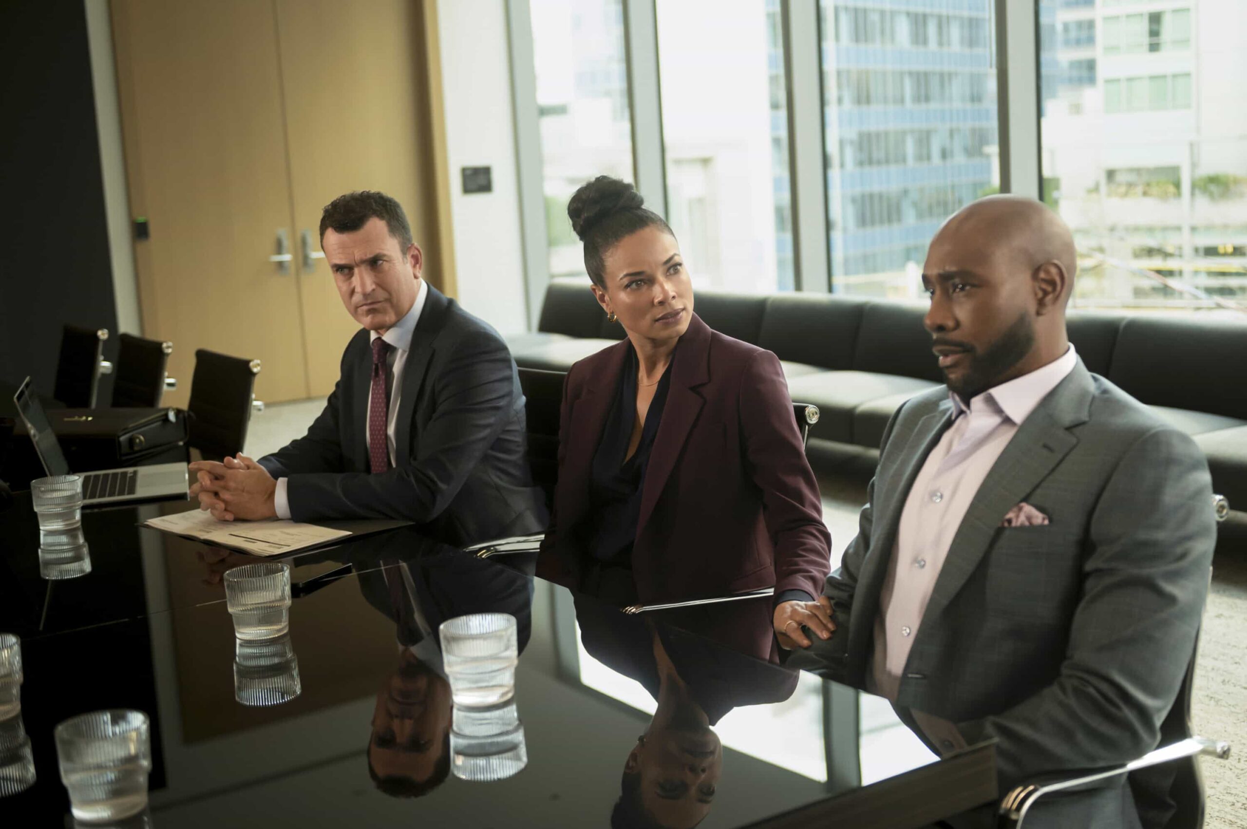 Watson Season 2 Episode 14 “Wrongful Life” - Watson is sued for Wrongful Life by a long-term patient suffering from VACTERL association, who has to undergo multiple painful surgeries after a freak accident breaks his back, on WATSON, Sunday, March 22 (10:00-11:00 PM, ET/PT) on the CBS Television Network, and streaming on Paramount+*   Pictured (L-R): Paul Du Toit as Charles Morgan, Rochelle Aytes as Dr. Mary Morstan, and Morris Chestnut as Dr. John Watson   Photo: Sergei Bachlakov/CBS ©2025 CBS Broadcasting, Inc. All Rights Reserved.