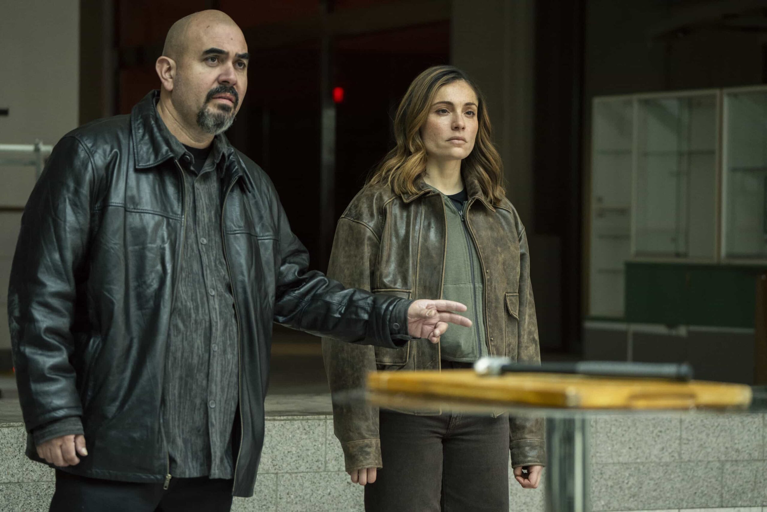 FBI Season 8 Episode 15 - “Crusader” – A dangerous drug kingpin from Eva’s past resurfaces when two children and a daycare worker are killed due to an accidental drug exposure. While the team works the case, Eva wavers between her mission as an agent and her personal vendetta, on the 150th episode of FBI, Monday, March 23 (9:00-10:00 PM, ET/PT). Pictured (L-R): Noel Guglielmi as Hector Vega and Juliana Aidén Martinez as Eva Ramos. Photo: Bennett Raglin/CBS ©2026 CBS Broadcasting, Inc. All Rights Reserved.