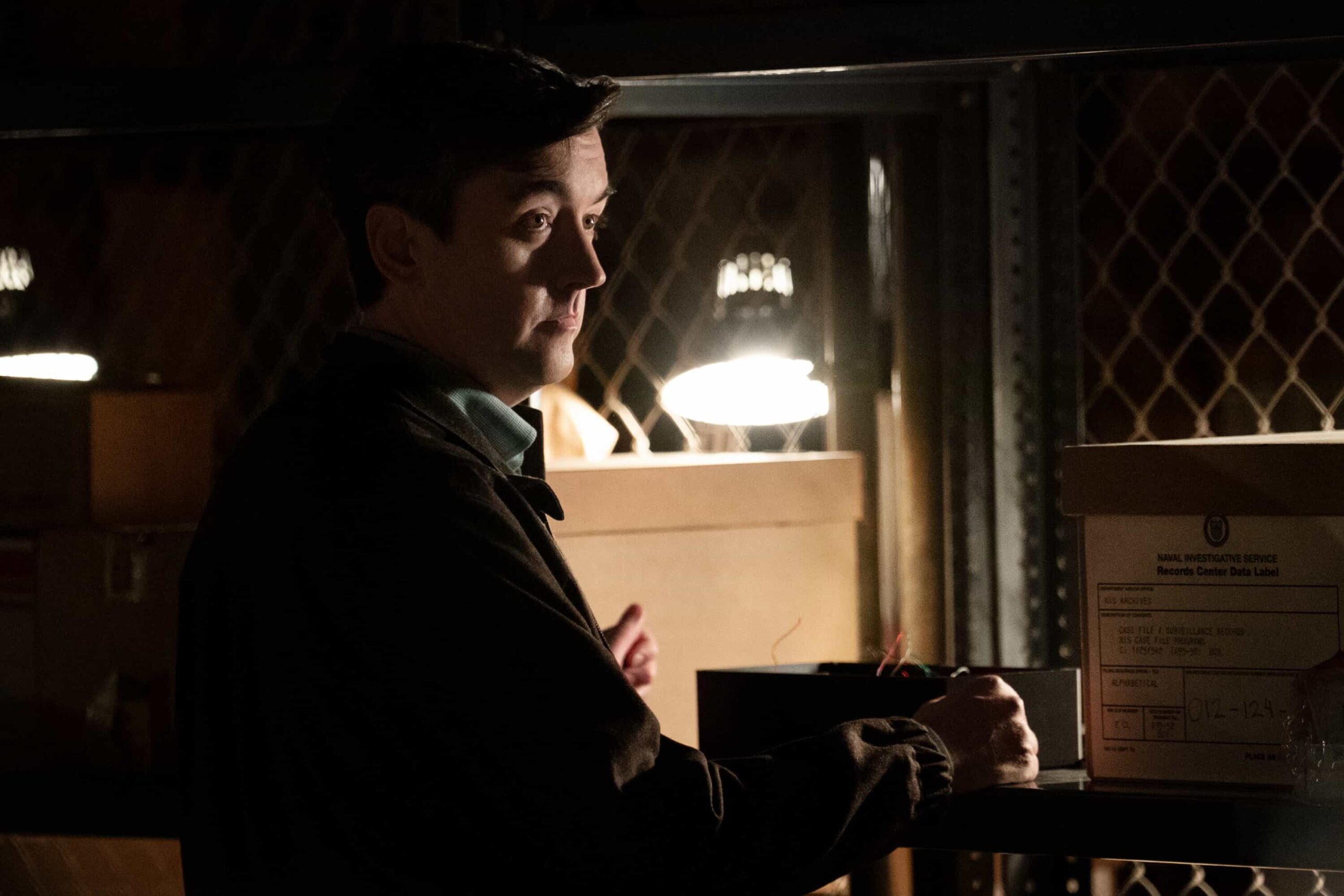 NCIS Season 23 Episode 13 - “All Good Things” – When the son of a Marine that Gibbs once helped comes to NCIS in desperation, the fractured team reunites off the books. But chasing justice without a badge may cost them more than their careers, on the 500th episode of the CBS Original series NCIS, Tuesday, March 24 (8:00-9:00 PM, ET/PT) on the CBS Television Network.  Pictured (L-R): Sean Murray as Timothy McGee, Gary Cole as Alden Parker, Wilmer Valderrama as Nick Torres, Katrina Law as Jessica Knight, Rocky Carroll as Leon Vance, Brian Dietzen as Jimmy Palmer and Diona Reasonover as Kasie Hines.  Photo: Robert Voets/CBS  ©2026 CBS Broadcasting, Inc. All Rights Reserved.