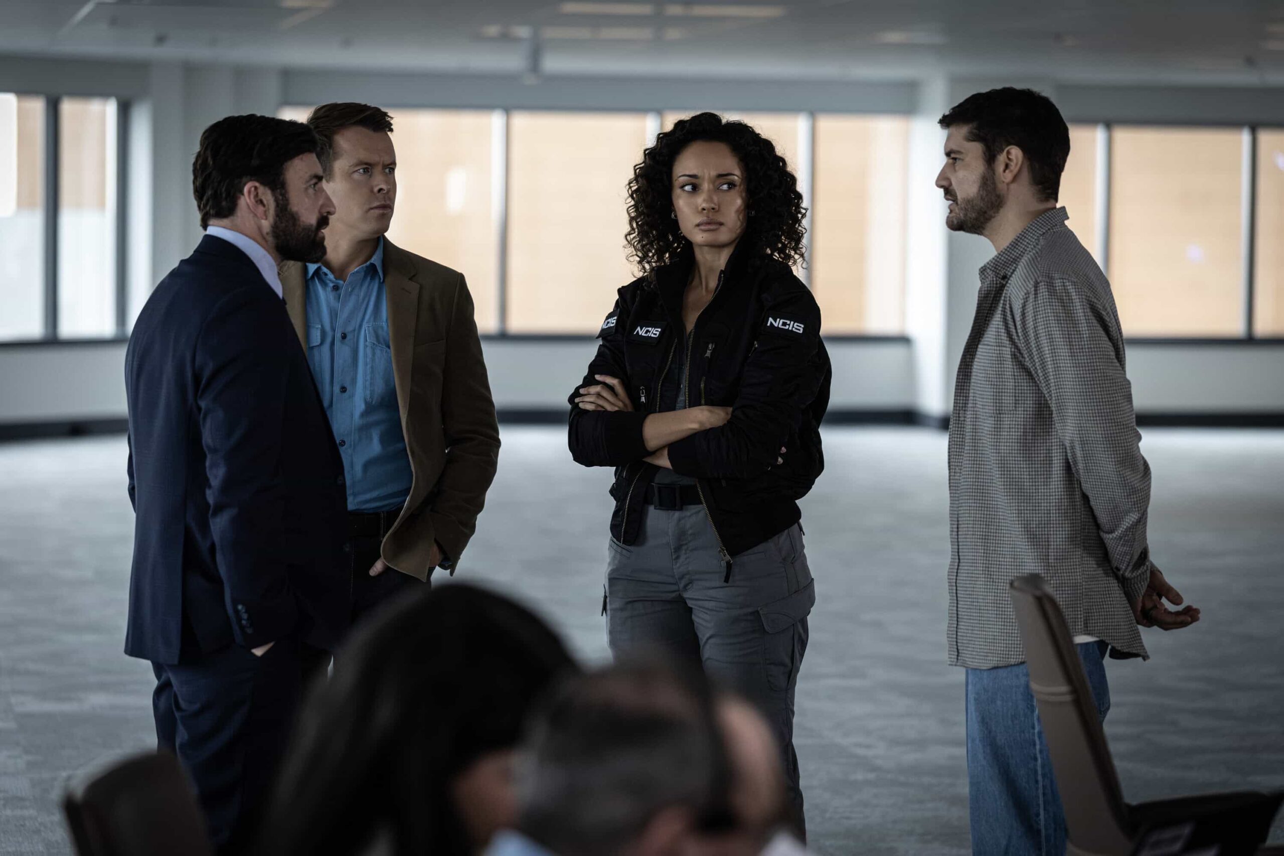 L-R: Johnny Carr as Rory Latham, Todd Lasance as AFP Liaison Officer Sergeant Jim \'JD\' Dempsey, Olivia Swann as NCIS Special Agent Captain Michelle Mackey, and Claude Jabbour as Travis “Trigger” Riggs in NCIS: Sydney episode 12, season 3 streaming on Paramount+, 2026. Photo Credit:  Daniel Asher Smith/Paramount+