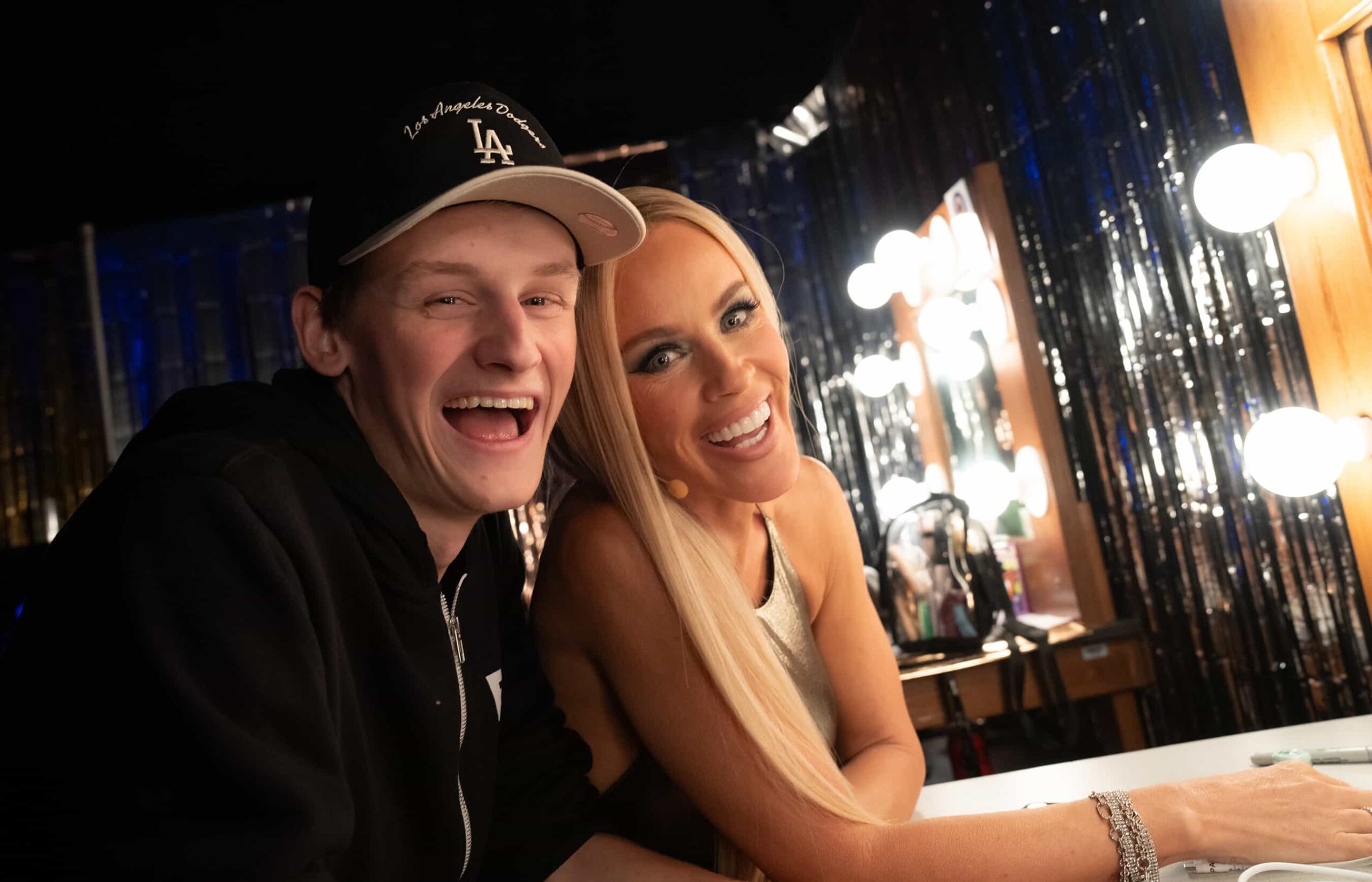 THE MASKED SINGER: L-R: Evan Asher and Jenny McCarthy Wahlberg on "Semi-Finals" episode of THE MASKED SINGER airing Wednesday, Mar. 25 (8:00-9 PM ET/PT) on FOX. ©2026 Fox Media LLC. CR: Trae Patton/ FOX.