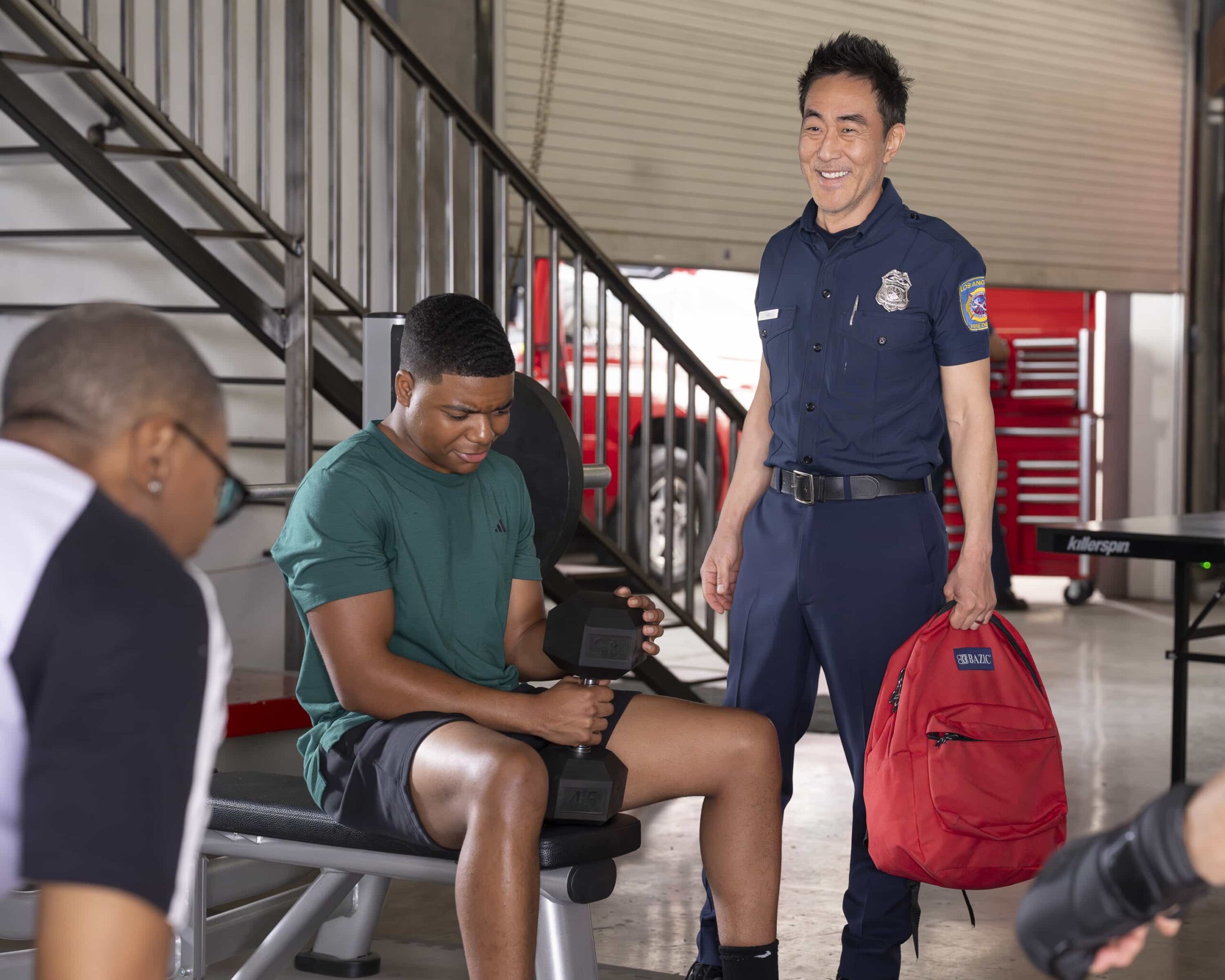 9-1-1 Season 9 Episode 15  - “Pick Your Poison” - Athena is pulled into a mysterious murder investigation when a man arrives at the station to report his own death. Meanwhile, the 118 races to the site of a car crash involving a mother and son. THURSDAY, MARCH 26 (8:00-9:00 p.m. EDT) on ABC.  (Disney/Christopher Willard) 
ELIJAH M. COOPER, KENNETH CHOI