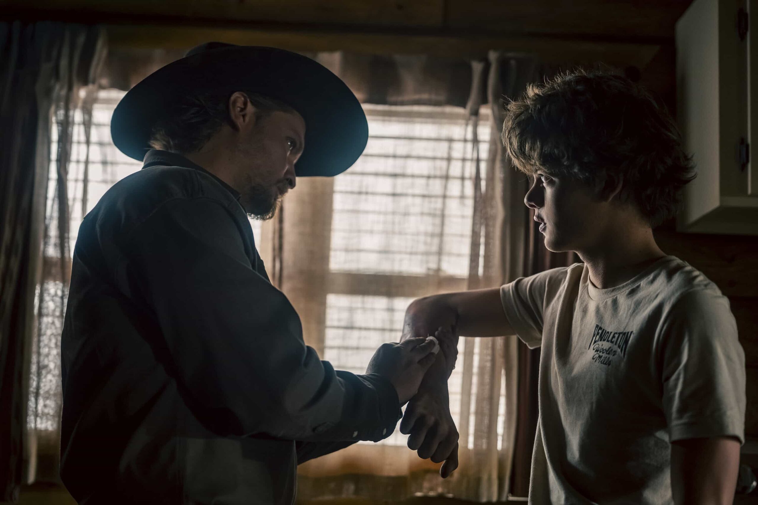 "Lost Girls" -- CBS Original Series MARSHALS, scheduled to air on Sunday, March 29 (8:00-9:00 PM ET/PT). Pictured (L-R): Luke Grimes as Kayce Dutton and Brecken Merrill as Tate Dutton. Photo: Christopher Saunders/CBS ©2025 CBS Broadcasting, Inc. All Rights Reserved.