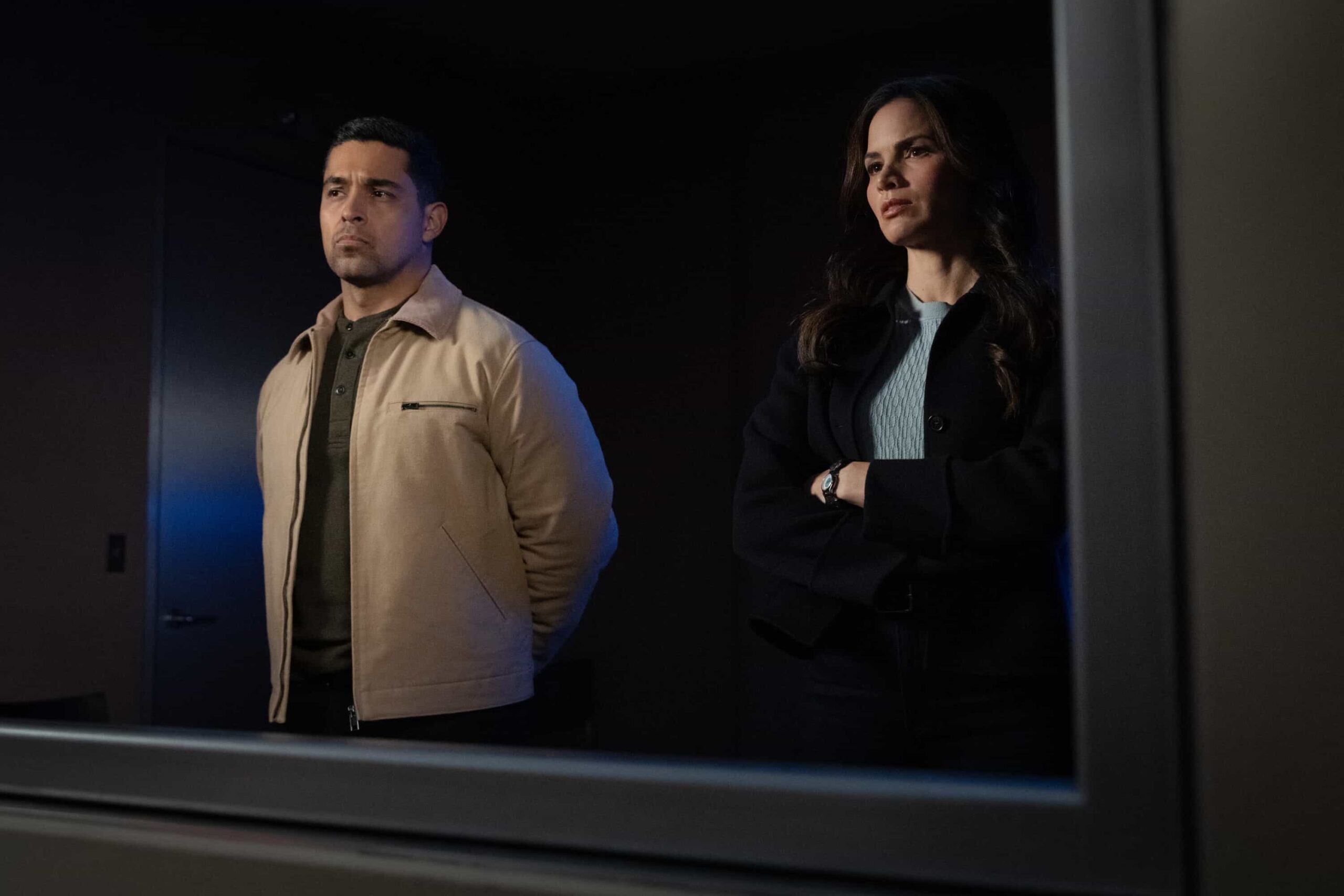 NCIS Season 23 Episode 14 Image —  “Fleeting” – Navy Week turns electric when a stolen squad car flips and reveals a sailor stabbed in the trunk. As D.C. spirals into chaos, the team chases a killer while carrying the weight of recent events, on the CBS Original series NCIS, Tuesday, March 31 (8:00-9:00 PM, ET/PT) on the CBS Television Network    Pictured (L-R): Wilmer Valderrama as Nick Torres and Katrina Law as Jessica Knight      Photo: Robert Voets/CBS ©20256CBS Broadcasting, Inc. All Rights Reserved.