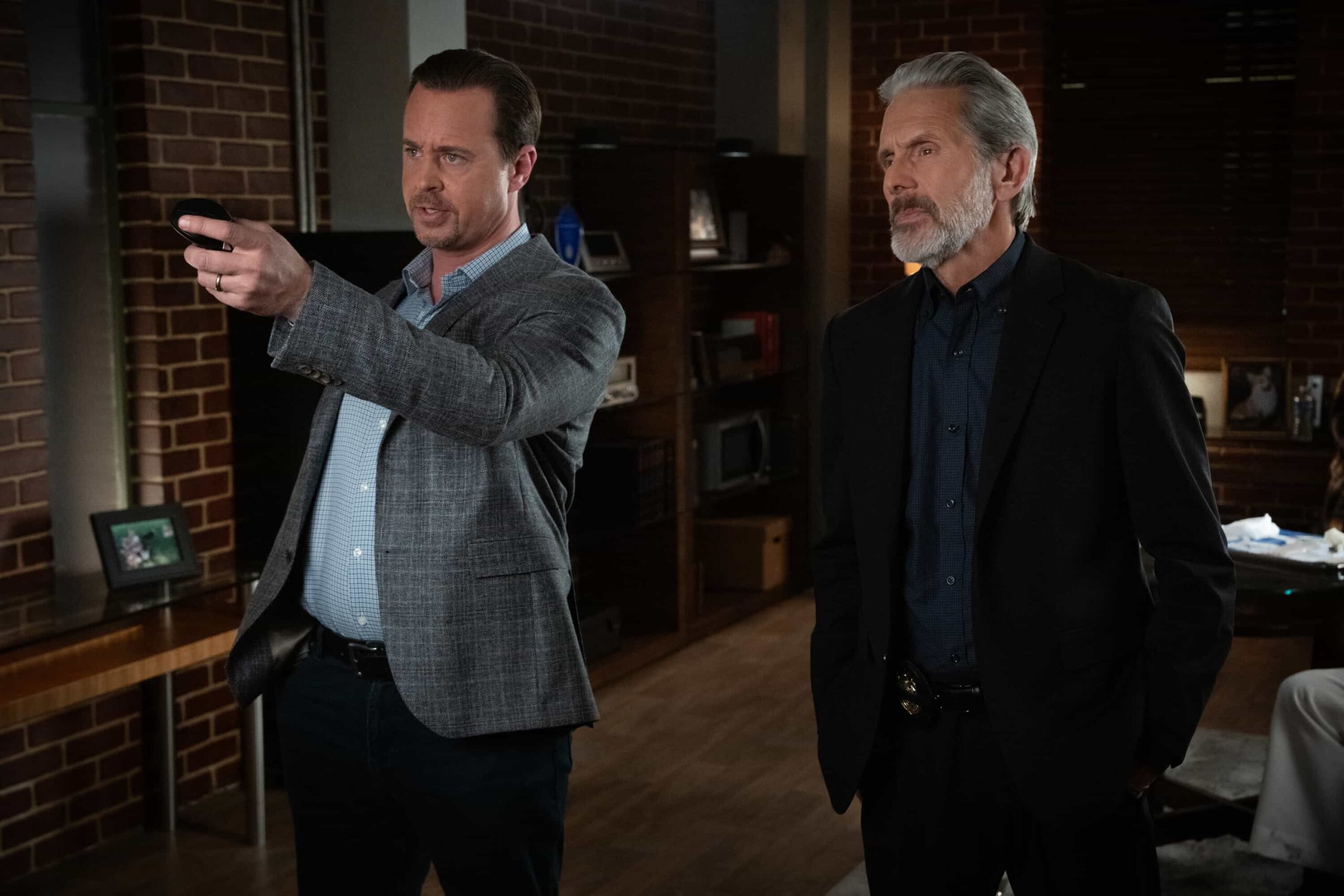 NCIS Season 23 Episode 14 —  “Fleeting” – Navy Week turns electric when a stolen squad car flips and reveals a sailor stabbed in the trunk. As D.C. spirals into chaos, the team chases a killer while carrying the weight of recent events, on the CBS Original series NCIS, Tuesday, March 31 (8:00-9:00 PM, ET/PT) on the CBS Television Network    Pictured (L-R): Sean Murray as Timothy McGee and Gary Cole as Alden Parker        Photo: Robert Voets/CBS ©20256CBS Broadcasting, Inc. All Rights Reserved.