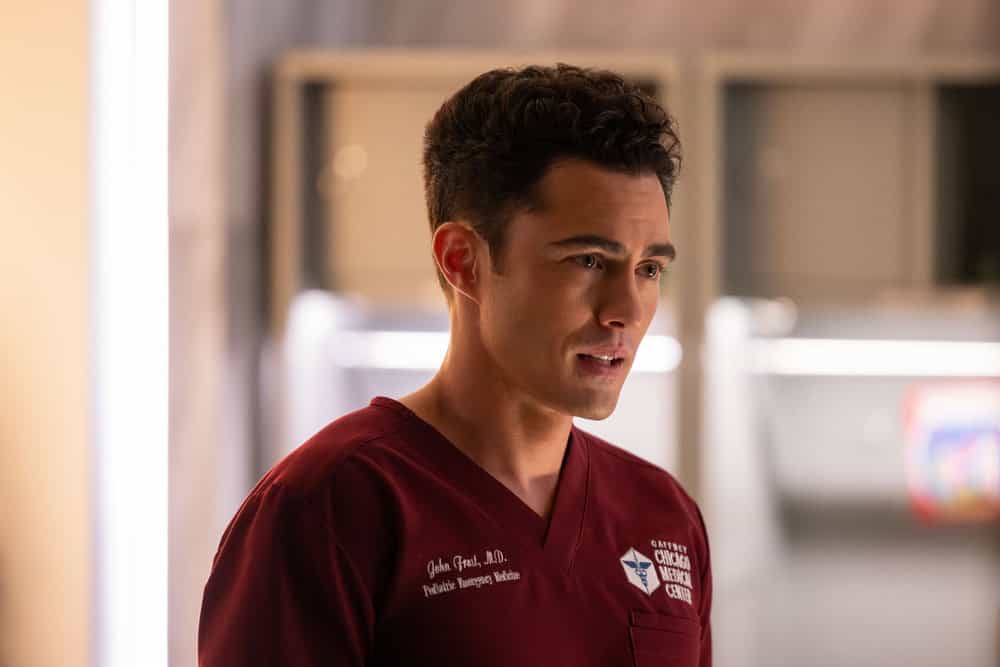 CHICAGO MED Season 11 Episode 16 Image -- "The Book of Charles" Episode 1115 -- Pictured: Darren Barnet as Dr. John Frost -- (Photo by: George Burns Jr/NBC)
