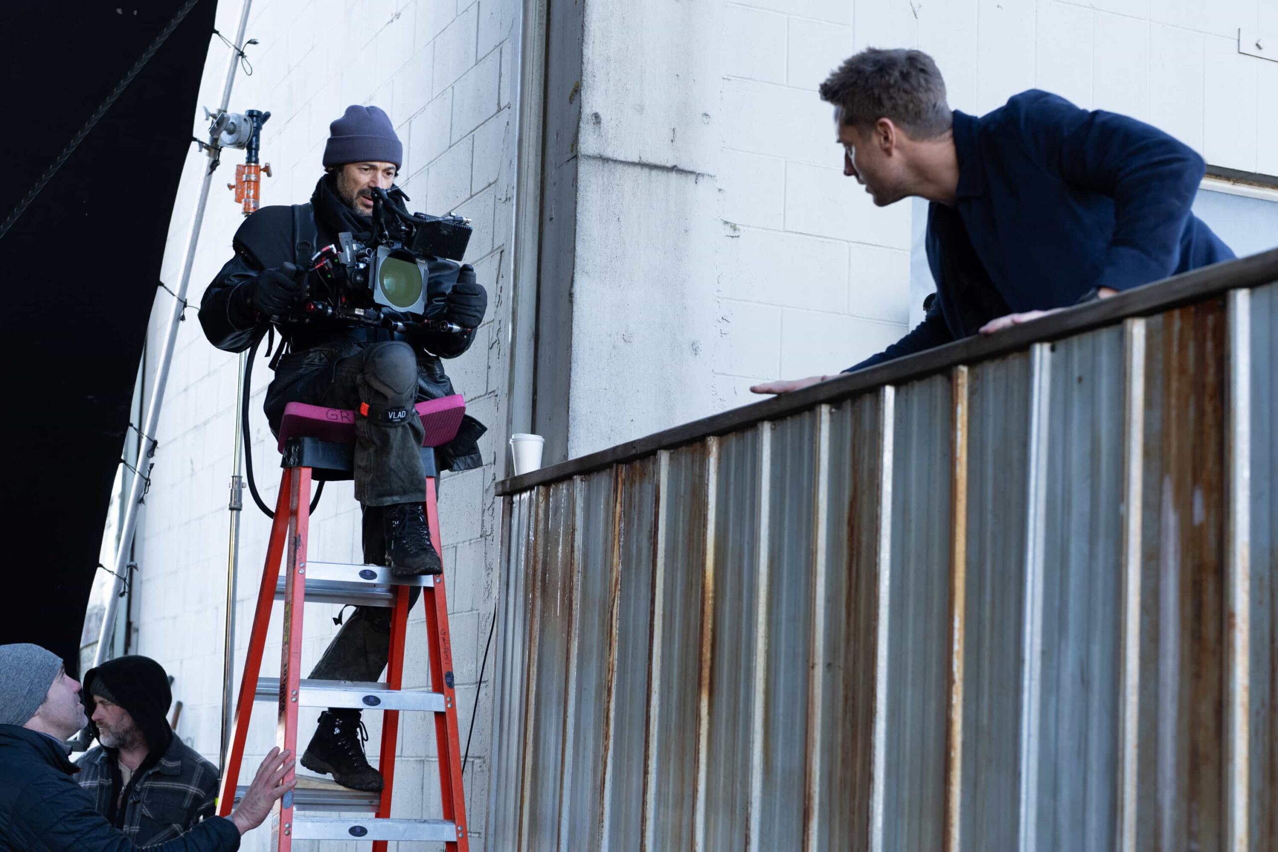 Behind The Scenes "No Good Deed" -- Coverage of the CBS Original Series TRACKER, scheduled to air on the CBS Television Network.  Pictured: A Camera Operator Vlad Horodinca and Justin Hartley. Photo: Darko Sikman/CBS ©2026 CBS Broadcasting, Inc. All Rights Reserved.