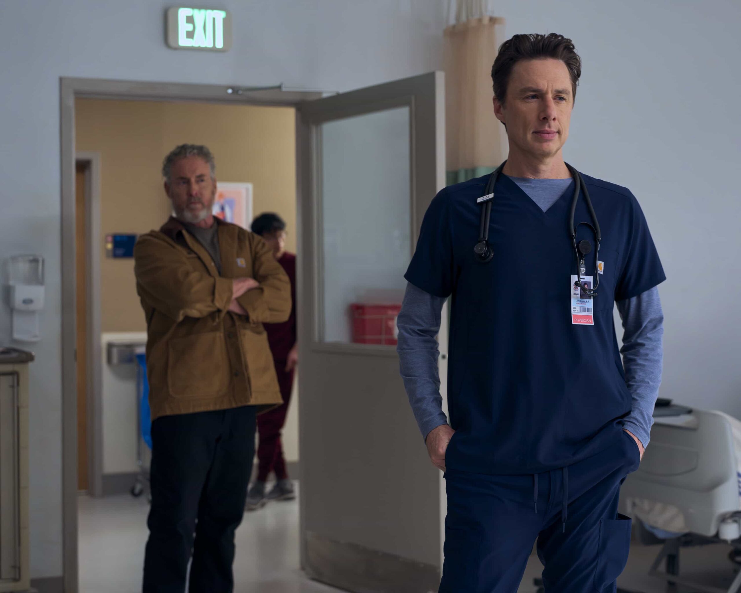 SCRUBS Season 10 Episode 8 Photo - “My Odds” - J.D. has finally hit his stride as the new chief of medicine, only to be shaken by an unexpected visit. Meanwhile, Elliot grapples with being a good mentor for the interns while still holding them accountable. WEDNESDAY, APRIL 8 (8:00-8:30 p.m. EDT) on ABC. (Disney/Darko Sikman) 
JOHN C. MCGINLEY,  ZACH BRAFF