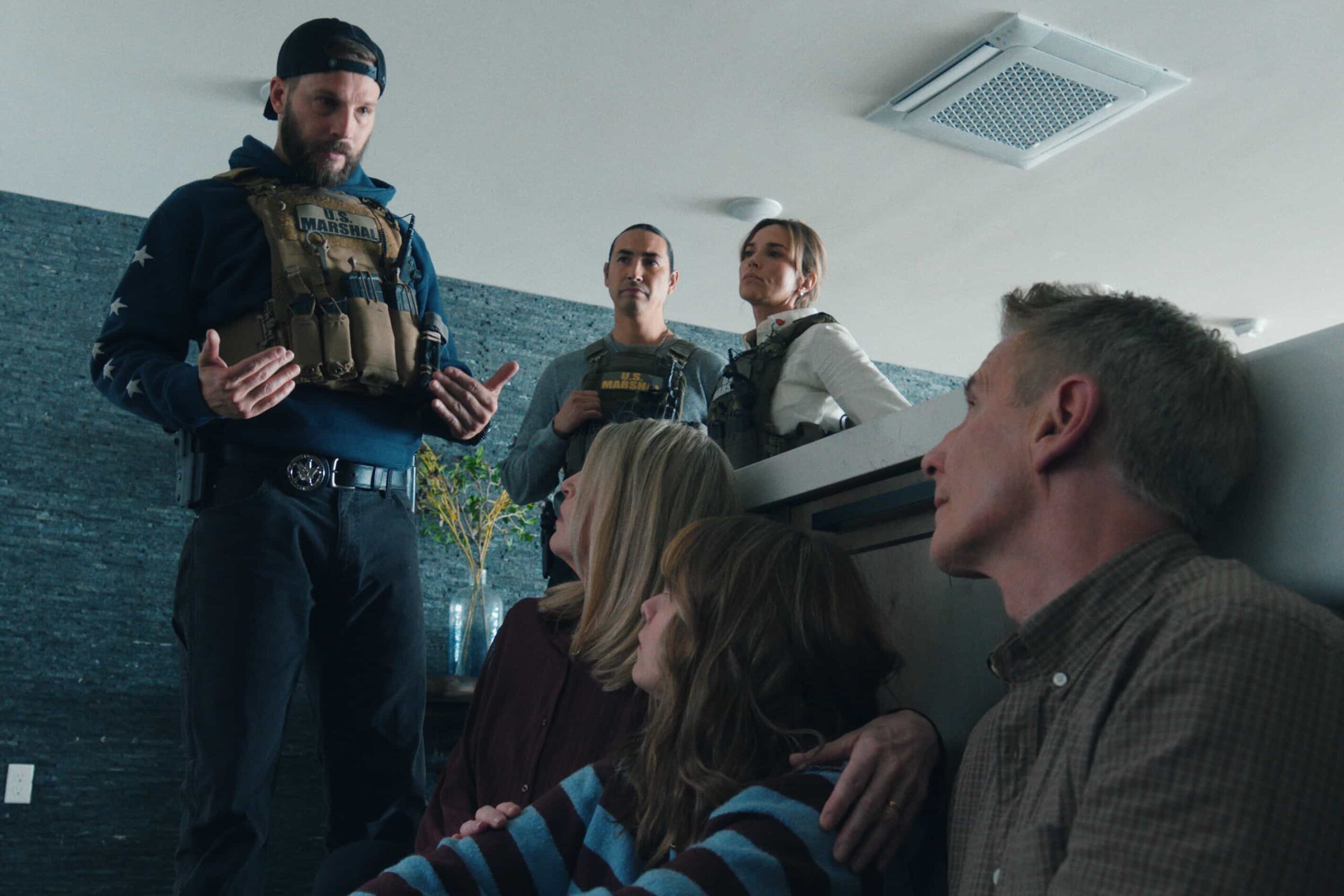 “Family Business” – CBS Original Series MARSHALS, scheduled to air on Sunday, April 12 (8:00-9:00 PM ET/PT). Pictured (L-R): Logan Marshall-Green as Pete Calvin, Tatanka Means as Miles, and Arielle Kebbel as Belle.  Photo: CBS ©2025 CBS Broadcasting, Inc. All Rights Reserved. Highest quality screengrab available.