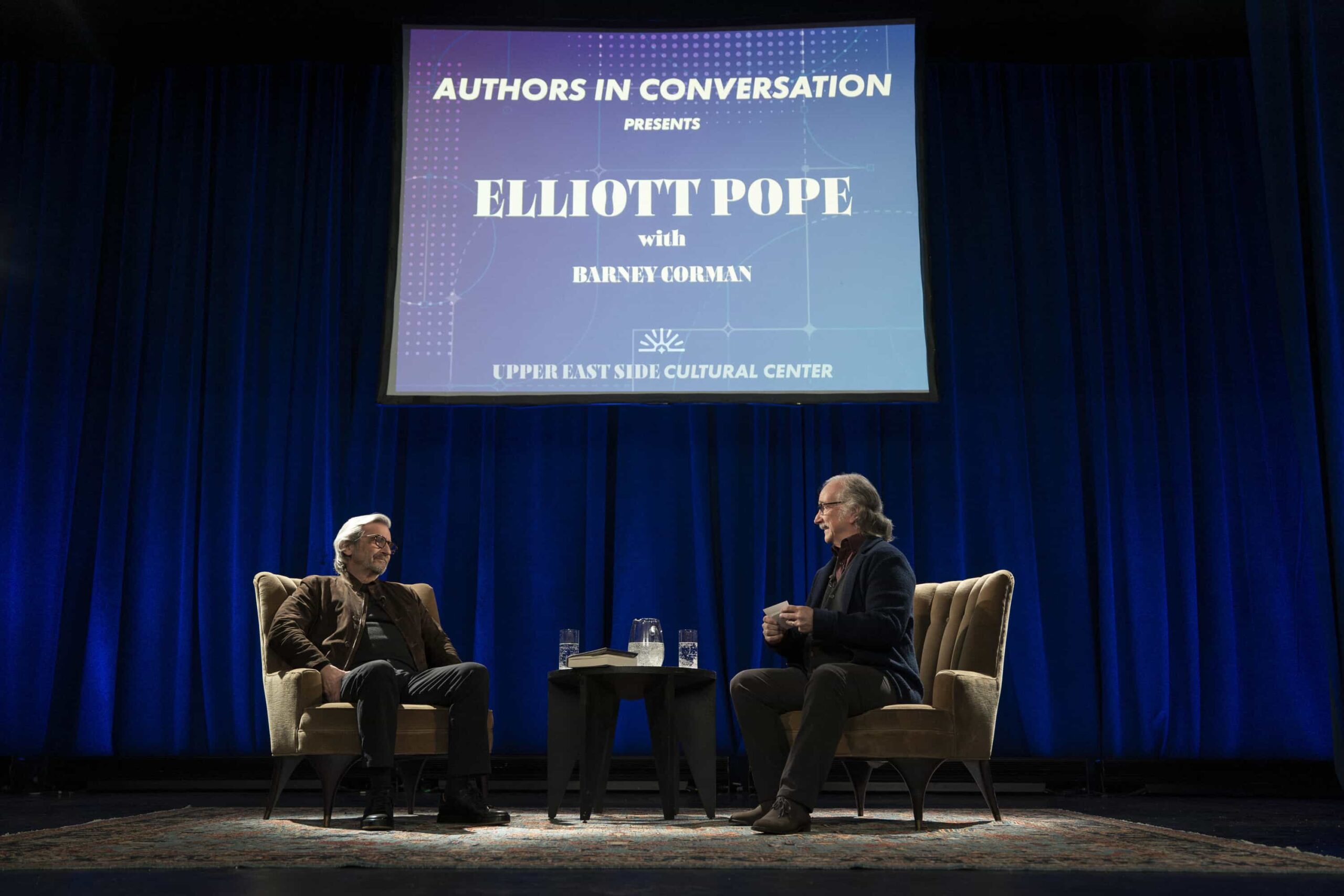 "Murder, He Wrote" -- Coverage of the CBS Original Series ELSBETH, scheduled to air on the CBS Television Network       Pictured L to R: Griffin Dunne as Elliott Pope and Mark Linn-Baker as Barney Corman   Photo: Michael Parmelee/CBS ©2026 CBS Broadcasting, Inc. All Rights Reserved.