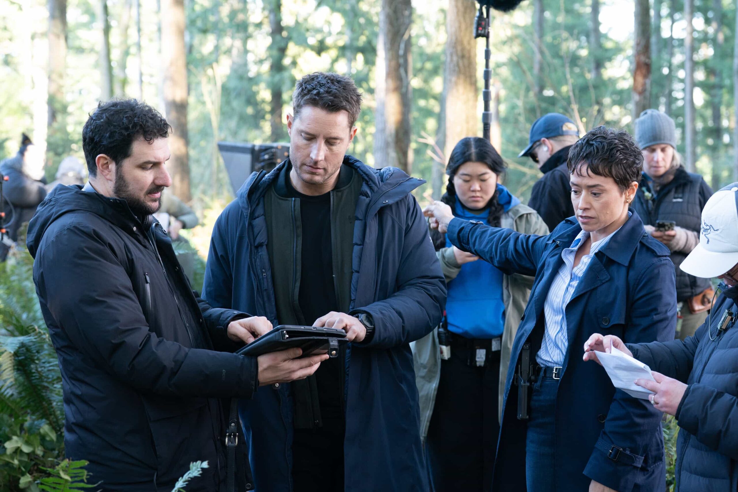Behind The Scenes - "Daughters" -- Coverage of the CBS Original Series TRACKER, scheduled to air on the CBS Television Network.  Pictured: Director Joel Novoa, Justin Hartley and Briana Venskus. Photo: Darko Sikman/CBS ©2026 CBS Broadcasting, Inc. All Rights Reserved.