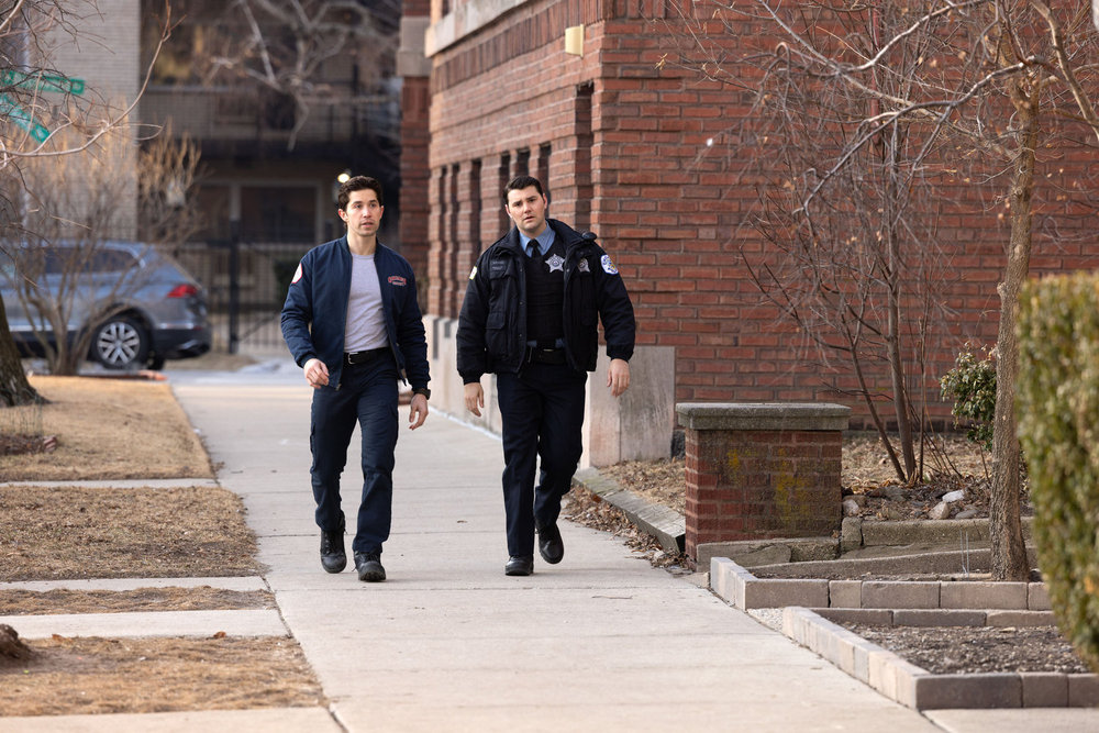 CHICAGO FIRE Season 14 Episode 18 -- "Instinct" Episode 1418 -- Pictured: (l-r) Brandon Larracuente as Sal Vasquez, JT Neal as Chris Girardi -- (Photo by: George Burns Jr/NBC)