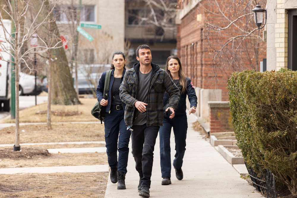 CHICAGO FIRE Season 14 Episode 18 -- "Instinct" Episode 1418 -- Pictured: (l-r) Hanako Greensmith as Violet Mikami, Garrett Coffey as Ryan, Jocelyn Hudon as Lyla Novak -- (Photo by: George Burns Jr/NBC)