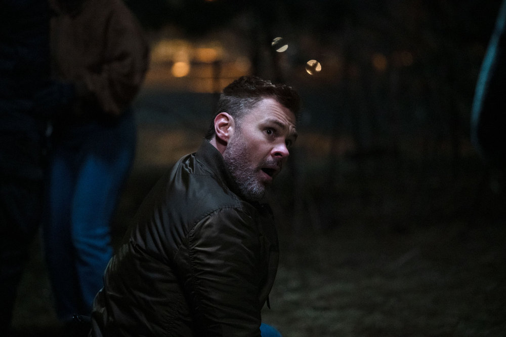 CHICAGO PD Season 13 Episode 18 -- "The Wicked River" Episode 1318 -- Pictured: Patrick John Flueger as Officer Adam Ruzek -- (Photo by: Lori Allen/NBC)