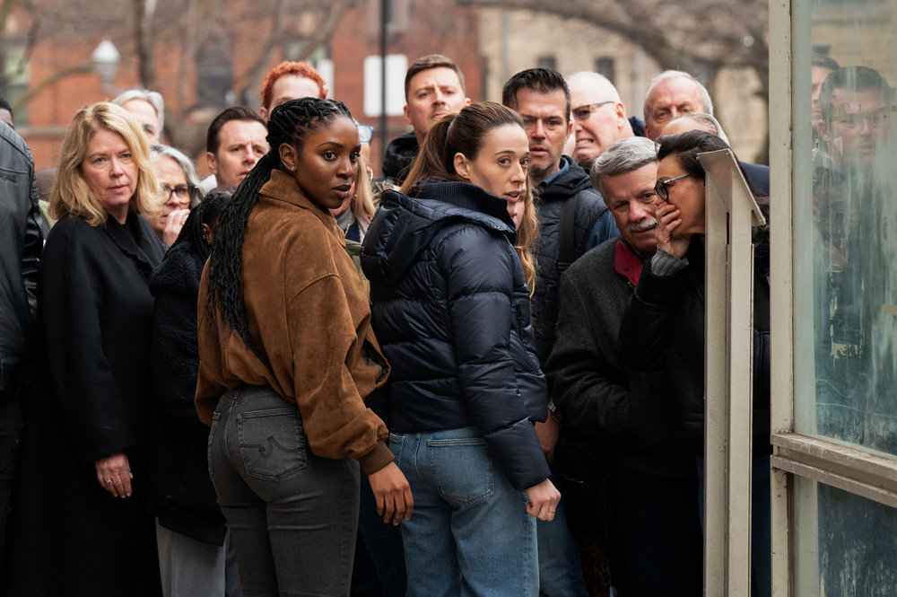 CHICAGO PD Season 13 Episode 18 -- "The Wicked River" Episode 1318 -- Pictured: (l-r) Karen Obilom as Tasha Fox, Marina Squerciati as Officer Kim Burgess -- (Photo by: Lori Allen/NBC)