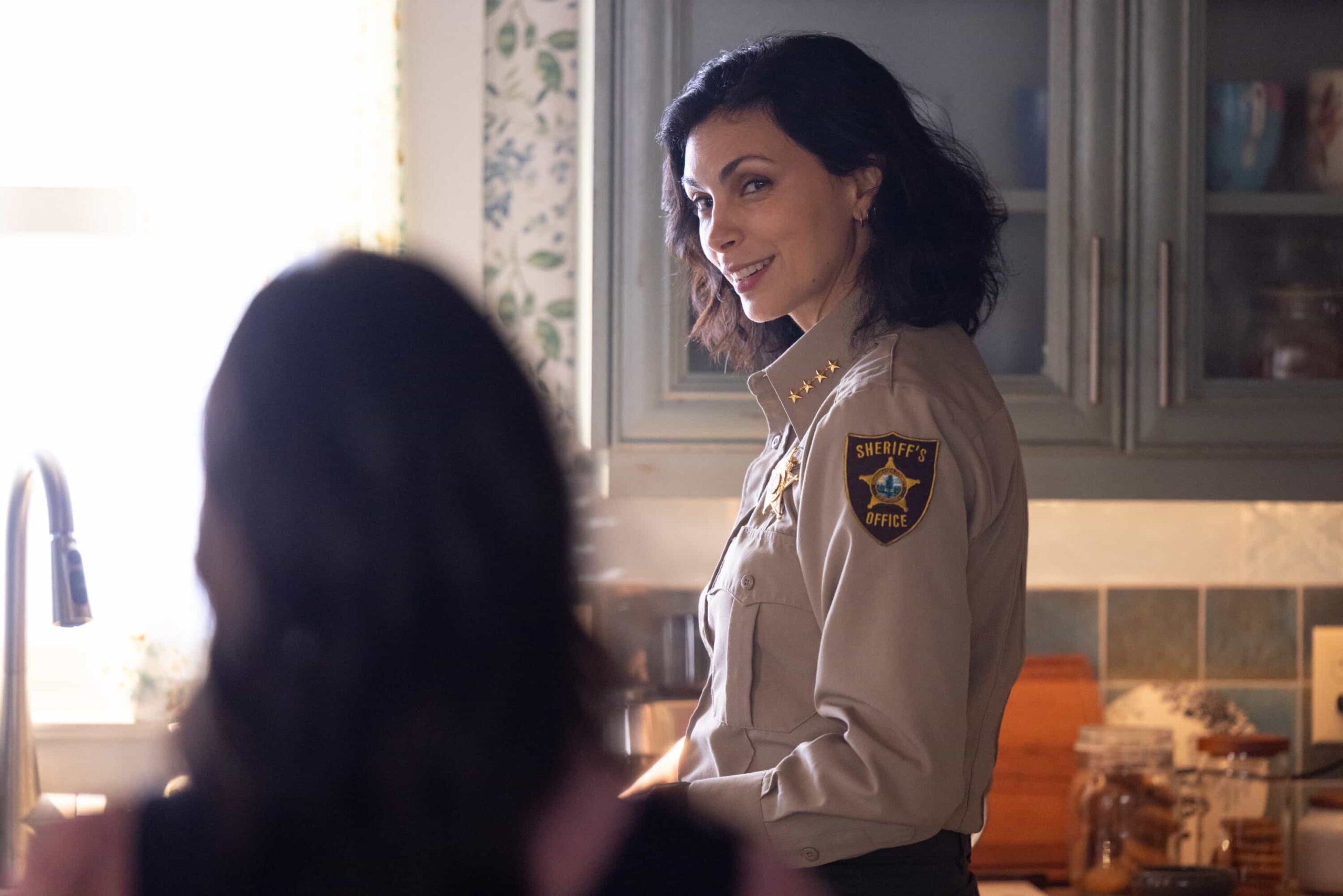 “Twenty Four Candles” – While Skye celebrates her 24th birthday, Sheriff Mickey Fox investigates a brutal attack tied to a land-grab scheme, on SHERIFF COUNTRY, Friday, April 24. Pictured: Morena Baccarin as Sheriff Mickey Fox. Photo: Darren Goldstein/CBS ©2025 CBS Broadcasting, Inc. All Rights Reserved.