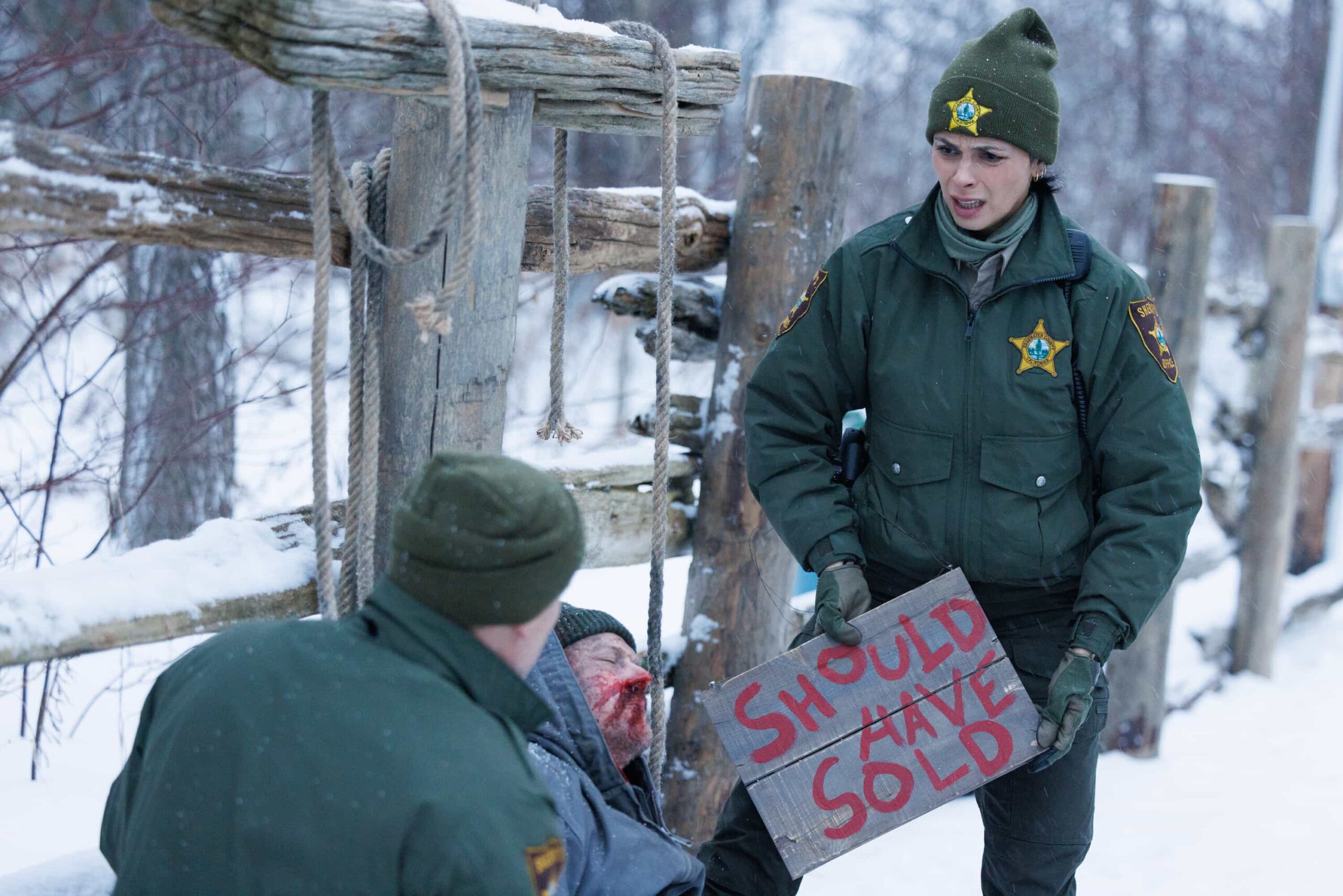 “Twenty Four Candles” – While Skye celebrates her 24th birthday, Sheriff Mickey Fox investigates a brutal attack tied to a land-grab scheme, on SHERIFF COUNTRY, Friday, April 24. Pictured: Dylan Taylor as Dale Hawkins and Morena Baccarin as Sheriff Mickey Fox. Photo: Darren Goldstein/CBS ©2025 CBS Broadcasting, Inc. All Rights Reserved.