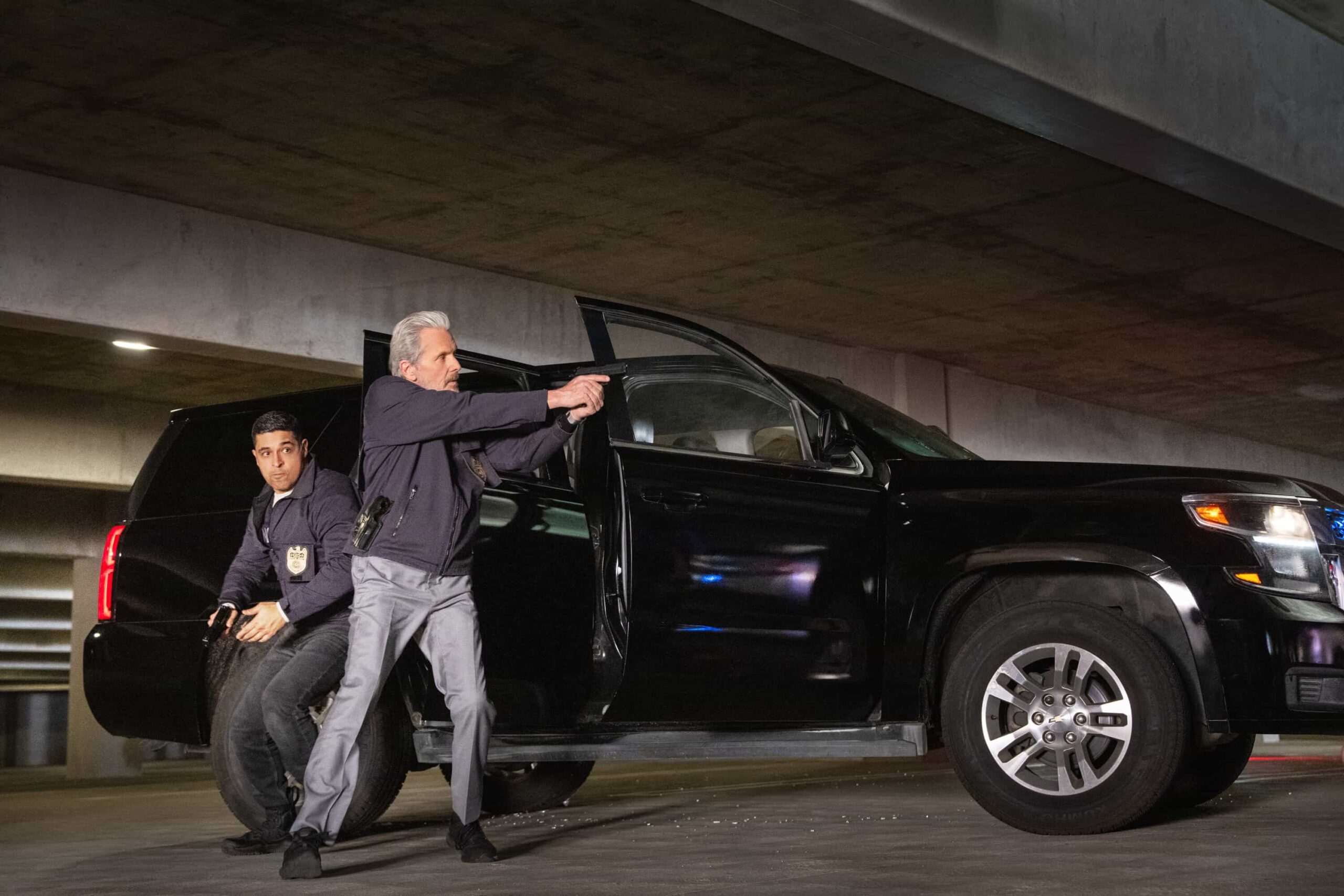 NCIS Season 23 Episode 18 “BAD IMPRESSIONS” - CBS Original Series NCIS, scheduled to air TUESDAY, APRIL 28 (8:00 PM ET/PT)    Pictured (L-R): Gary Cole as Alden Parker, Wilmer Valderrama as Nick Torres    Photo: Robert Voets/CBS   ©2026 CBS Broadcasting, Inc. All Rights Reserved.