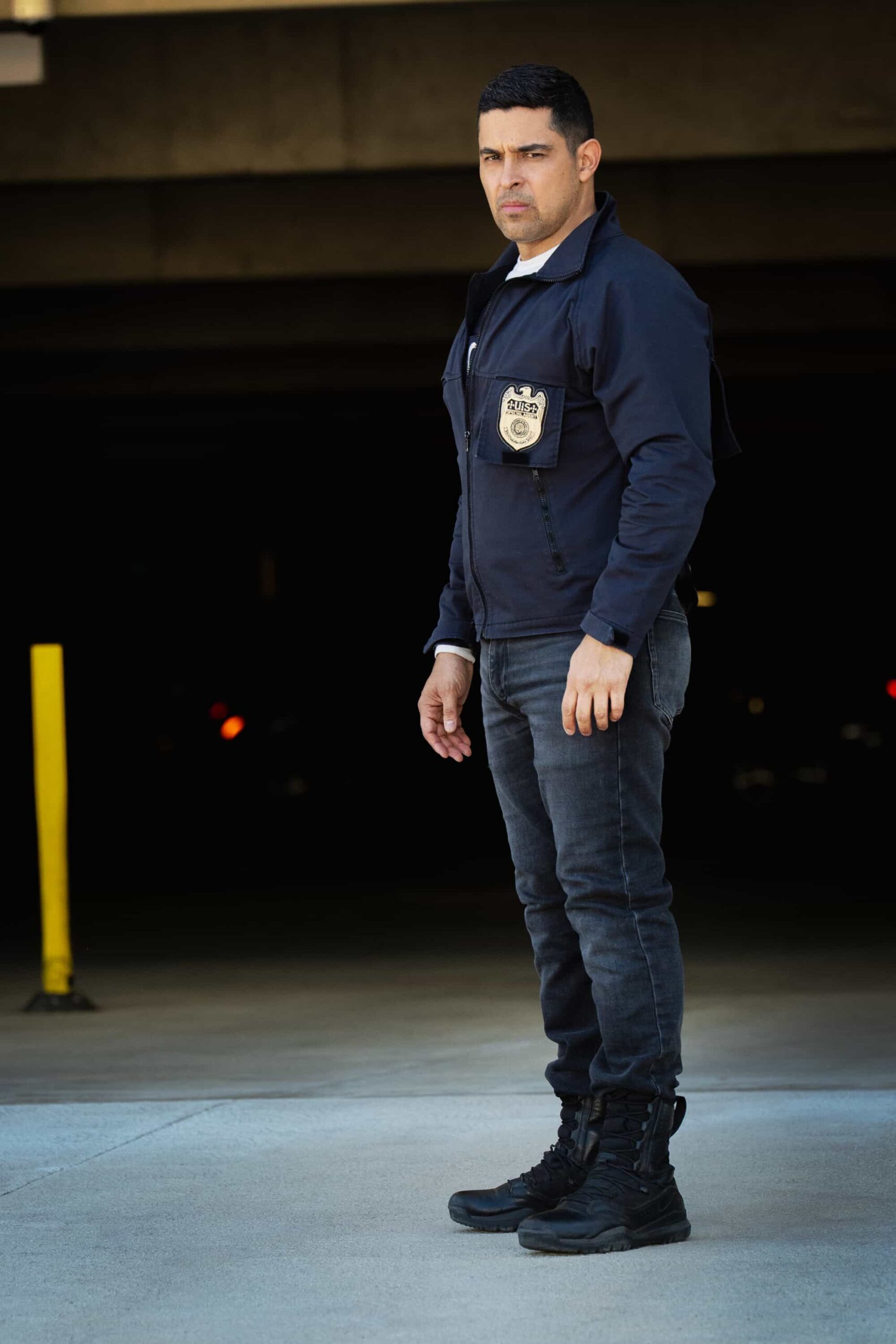 NCIS Season 23 Episode 18 “BAD IMPRESSIONS” - CBS Original Series NCIS, scheduled to air TUESDAY, APRIL 28 (8:00 PM ET/PT)    Pictured (L-R): Wilmer Valderrama as Nick Torres  Photo: Robert Voets/CBS   ©2026 CBS Broadcasting, Inc. All Rights Reserved.