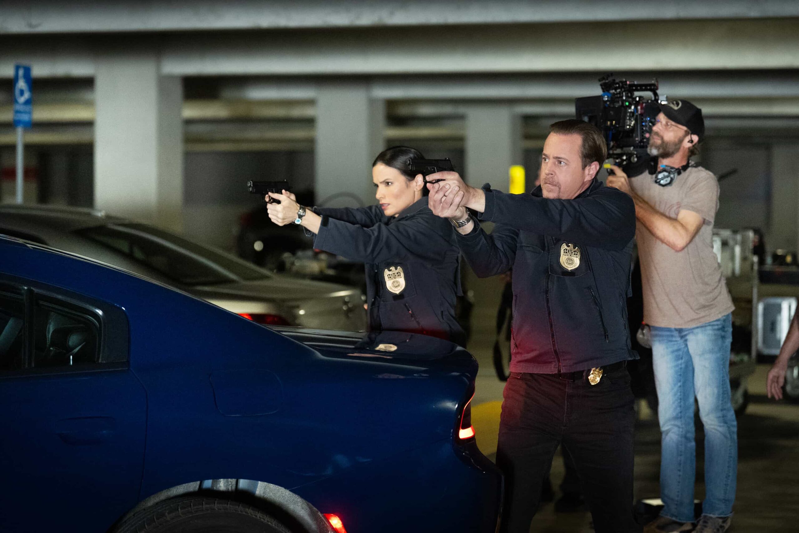 NCIS Season 23 Episode 18 Behind The Scenes “BAD IMPRESSIONS” - CBS Original Series NCIS, scheduled to air TUESDAY, APRIL 28 (8:00 PM ET/PT)    Pictured (L-R): Sean Murray as Timothy McGee, Katrina Law as Jessica Knight,    Photo: Robert Voets/CBS   ©2026 CBS Broadcasting, Inc. All Rights Reserved.