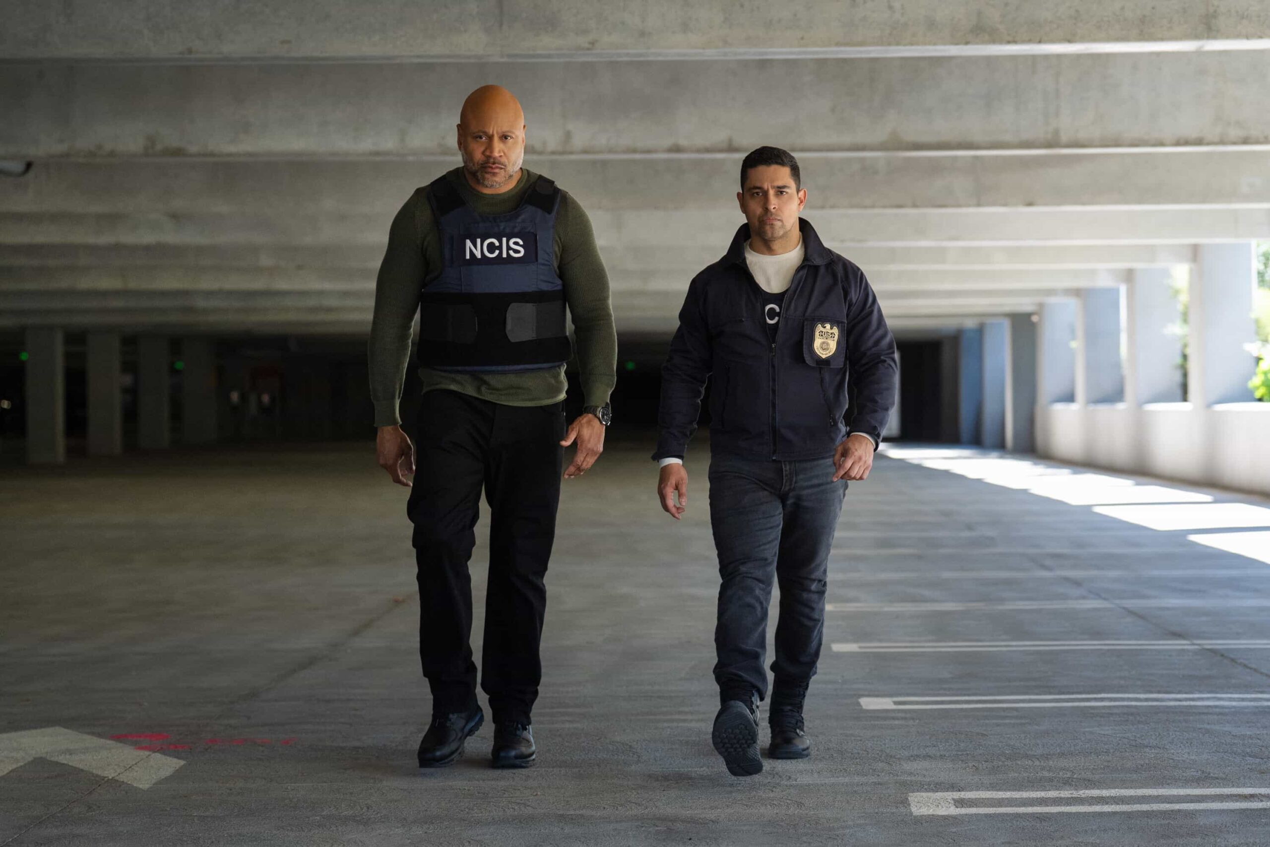 “BAD IMPRESSIONS” - CBS Original Series NCIS, scheduled to air TUESDAY, APRIL 28 (8:00 PM ET/PT)    Pictured (L-R):  LL COOL J  as Sam Hanna and  Wilmer Valderrama as Nick Torres,    Photo: Robert Voets/CBS   ©2026 CBS Broadcasting, Inc. All Rights Reserved.