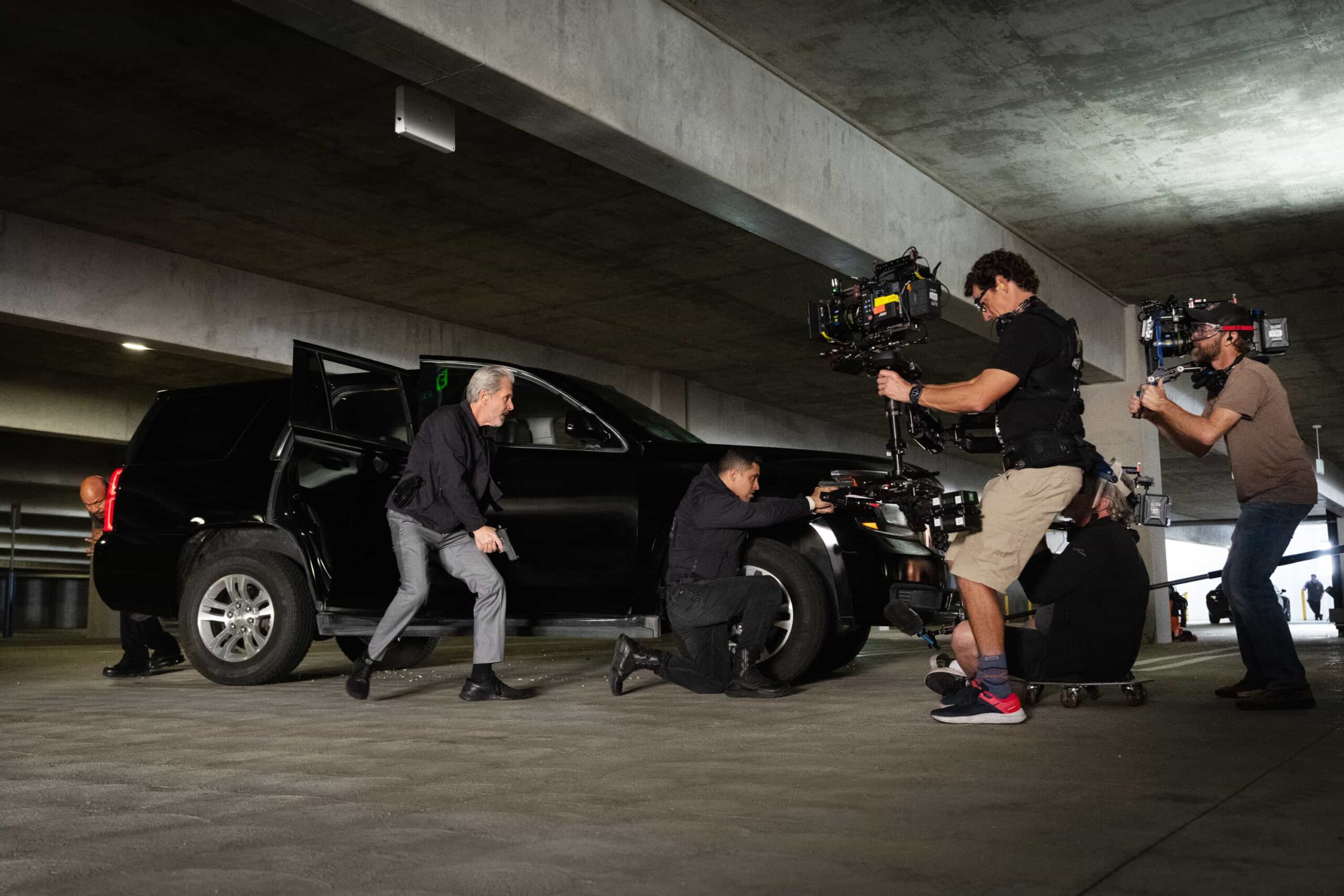 NCIS Season 23 Episode 18 Behind The Scenes “BAD IMPRESSIONS” - CBS Original Series NCIS, scheduled to air TUESDAY, APRIL 28 (8:00 PM ET/PT)    Pictured (L-R): Gary Cole as Alden Parker, Wilmer Valderrama as Nick Torres  Photo: Robert Voets/CBS   ©2026 CBS Broadcasting, Inc. All Rights Reserved.