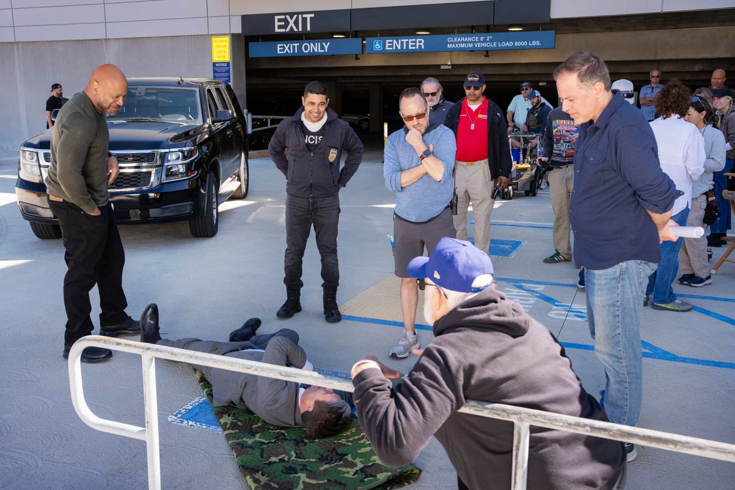 NCIS Season 23 Episode 18 Behind The Scenes “BAD IMPRESSIONS” - CBS Original Series NCIS, scheduled to air TUESDAY, APRIL 28 (8:00 PM ET/PT)    Pictured (L-R): LL COOL J as Sam Hanna and Wilmer Valderrama as Nick Torres  Photo: Robert Voets/CBS   ©2026 CBS Broadcasting, Inc. All Rights Reserved.