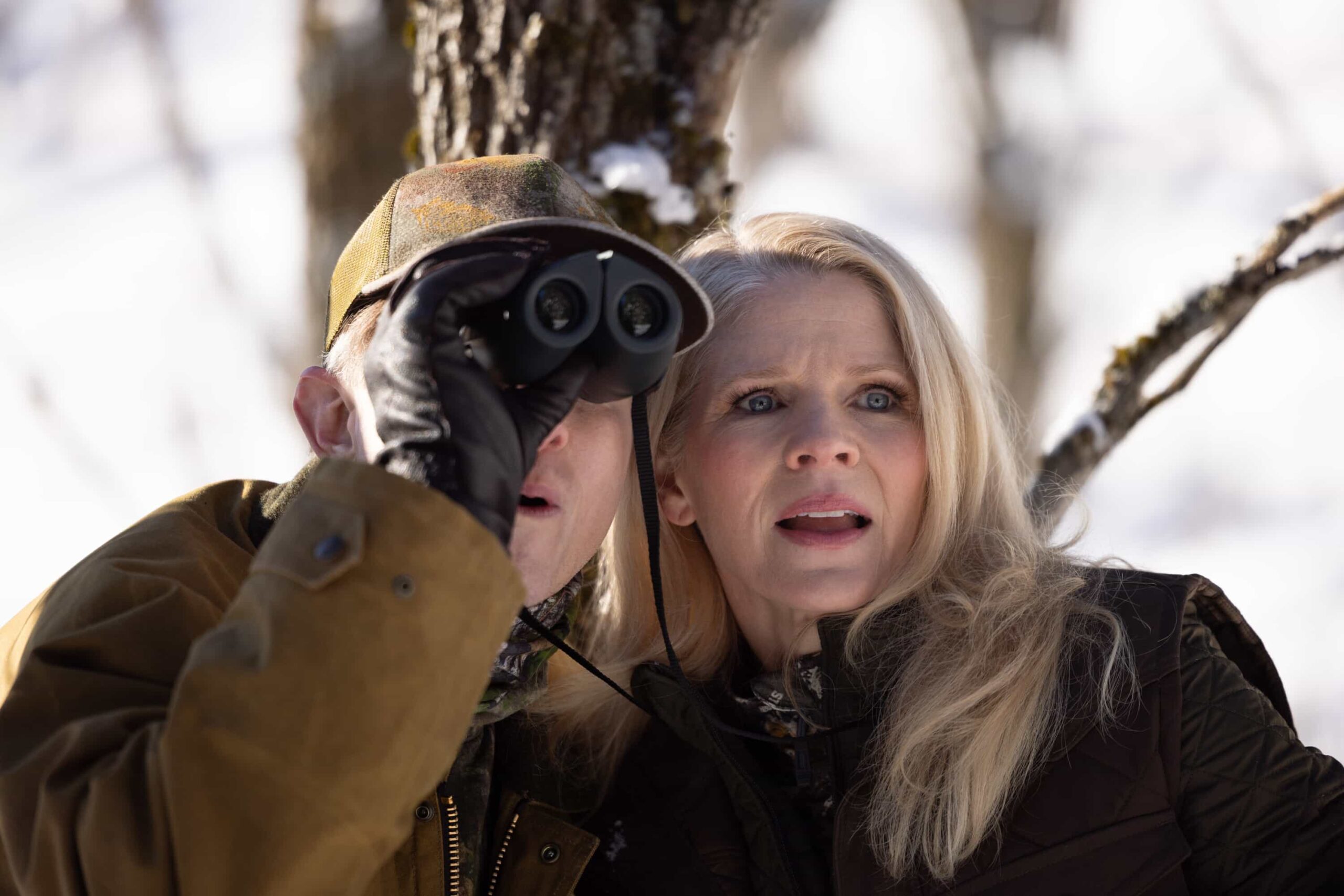 “The Hunting Party” – Sheriff Mickey Fox investigates a fatal shooting that appears to be a tragic accident during a lavish Fraley family boar hunt, setting off a chain of events with far-reaching consequences for Edgewater, on SHERIFF COUNTRY, Friday, May 1 (8:00-9:00 PM, ET/PT) on the CBS Television Network, and streaming on Paramount+. Pictured: Philip Riccio as Larry Norris and Kelli O’Hara as Miranda Fraley. Photo: Darren Goldstein/CBS ©2025 CBS Broadcasting, Inc. All Rights Reserved.