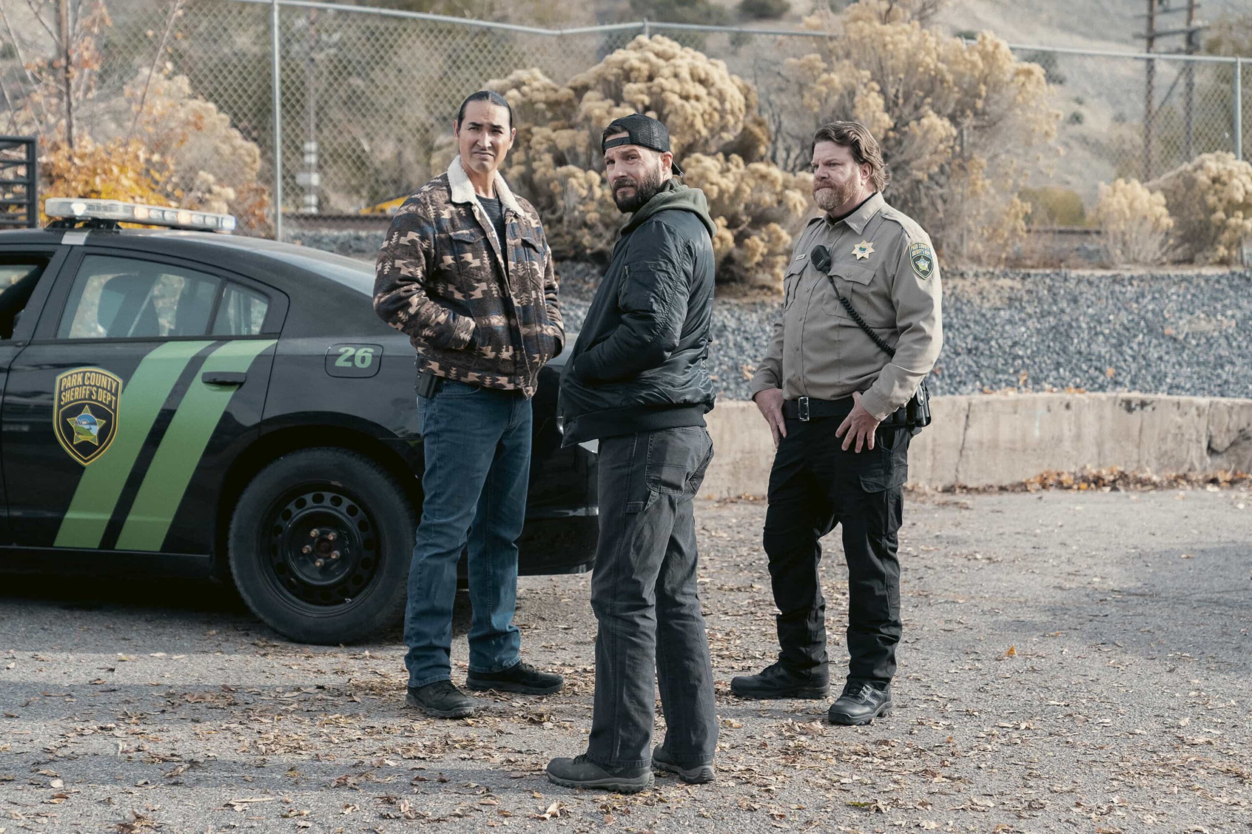 "Playing with Fire" -- CBS Original Series MARSHALS, scheduled to air on Sunday, May 3 (8:00-9:00 PM ET/PT).  Pictured (L-R): Tatanka Means as Miles, Logan Marshall-Green as Pete Calvin, and Michael Holley as Sheriff Hollings.  Photo: Cam McLeod/CBS ©2025 CBS Broadcasting, Inc. All Rights Reserved.
