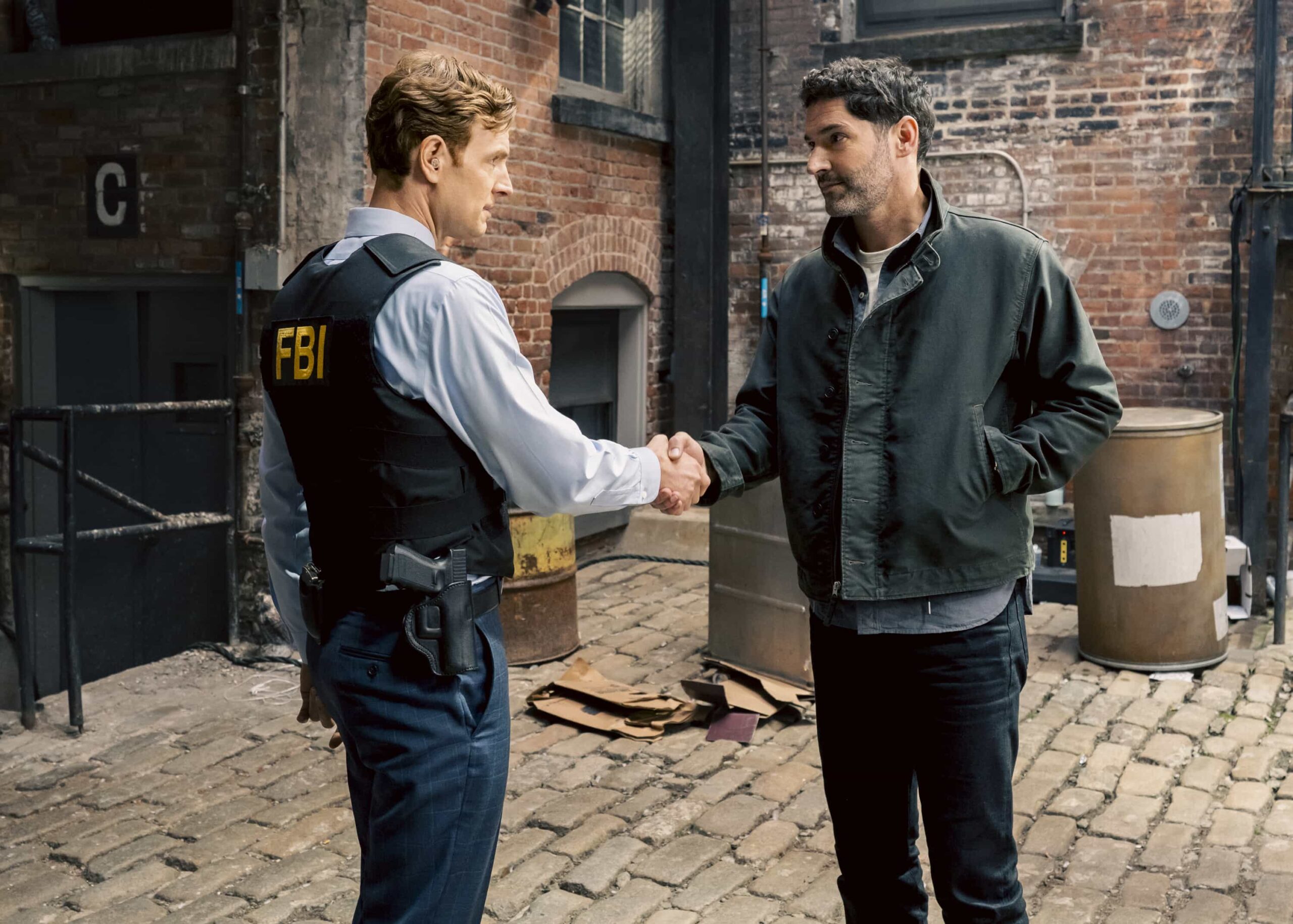 "Rare Earth" -- CBS Original Series CIA, scheduled to air on Monday, May 4 (10:00-11:00 PM, ET/PT).  Pictured (L-R): Nick Gehlfuss as Special Agent Bill Goodman and Tom Ellis as CIA Case Officer Colin Glass. Photo: Mark Schafer/CBS ©2025 CBS Broadcasting, Inc. All Rights Reserved.