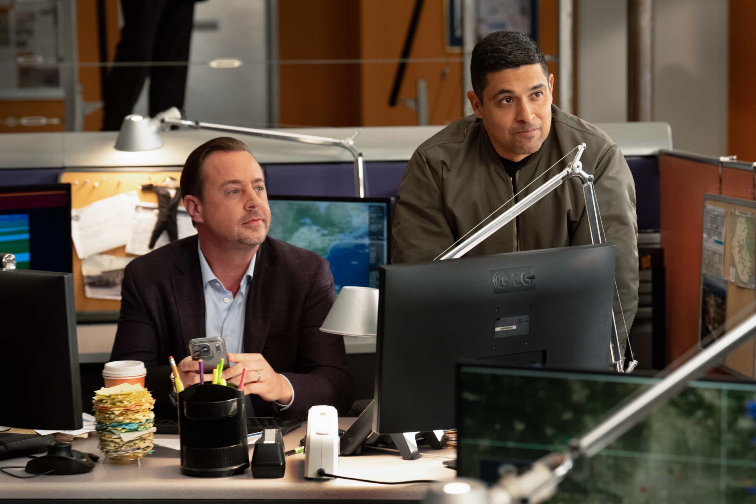 “DEAL WITH THE DEVIL” - CBS Original Series NCIS, scheduled to air TUESDAY, MAY 5 (8:00 PM ET/PT)  Pictured (L-R): Sean Murray as Timothy McGee, Wilmer Valderrama as Nick Torres  Photo: Robert Voets/CBS  ©2026 CBS Broadcasting, Inc. All Rights Reserved.