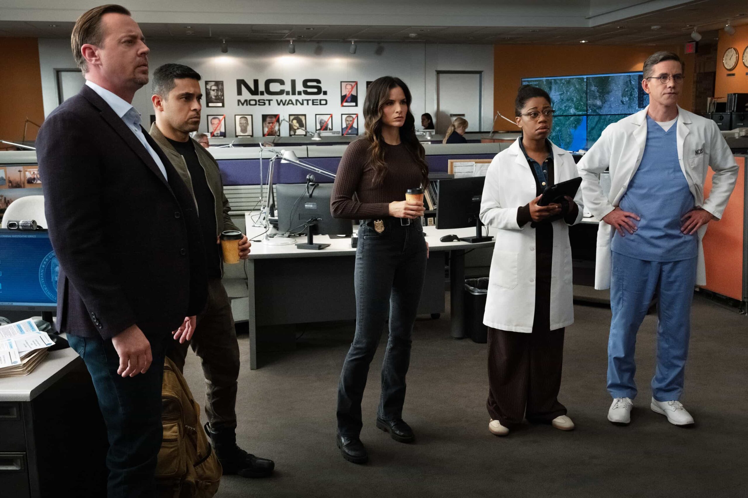 NCIS Season 23 Episode 19  “DEAL WITH THE DEVIL” - CBS Original Series NCIS, scheduled to air TUESDAY, MAY 5 (8:00 PM ET/PT)  Pictured (L-R): Sean Murray as Timothy McGee,  Wilmer Valderrama as Nick Torres, Katrina Law as Jessica Knight, Brian Dietzen as Jimmy Palmer and Diona Reasonover as Kasie Hines.  Photo: Robert Voets/CBS  ©2026 CBS Broadcasting, Inc. All Rights Reserved.