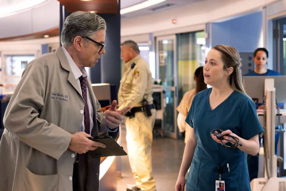 Chicago Med Season 11 Episode 20 -- "Hell Breaks Loose" Episode 1120 -- Pictured: (l-r) Oliver Platt as Dr. Daniel Charles, Kim Quindlen as Nurse Kacy -- (Photo by: George Burns Jr/NBC)