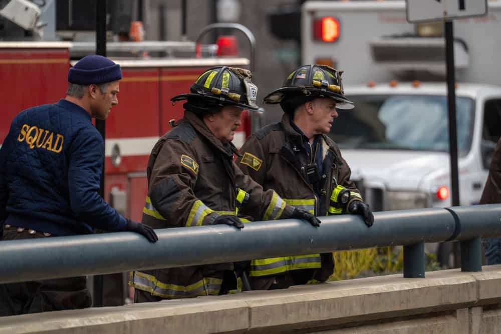 CHICAGO FIRE Season 14 Episode 20 -- "Speak of the Devil" Episode 1420 -- Pictured: (l-r) Taylor Kinney as Severide, Christian Stolte as Randall "Mouch" McHolland, David Eigenberg as Christopher Herrmann -- (Photo by: Peter Gordon/NBC)