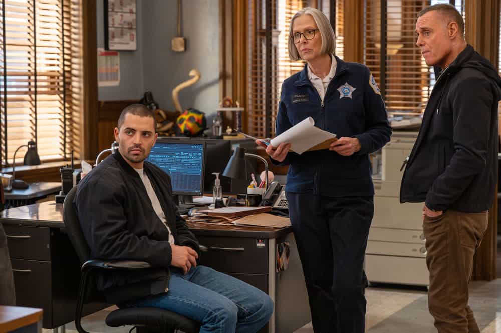 CHICAGO P.D. -- "The Lost Years" Episode 1320 -- Pictured: (l-r) Benjamin Levy Aguilar as Dante Torres, Amy Morton as Desk Sgt. Trudy Platt, Jason Beghe as Sergeant Hank Voight -- (Photo by: Lori Allen/NBC)