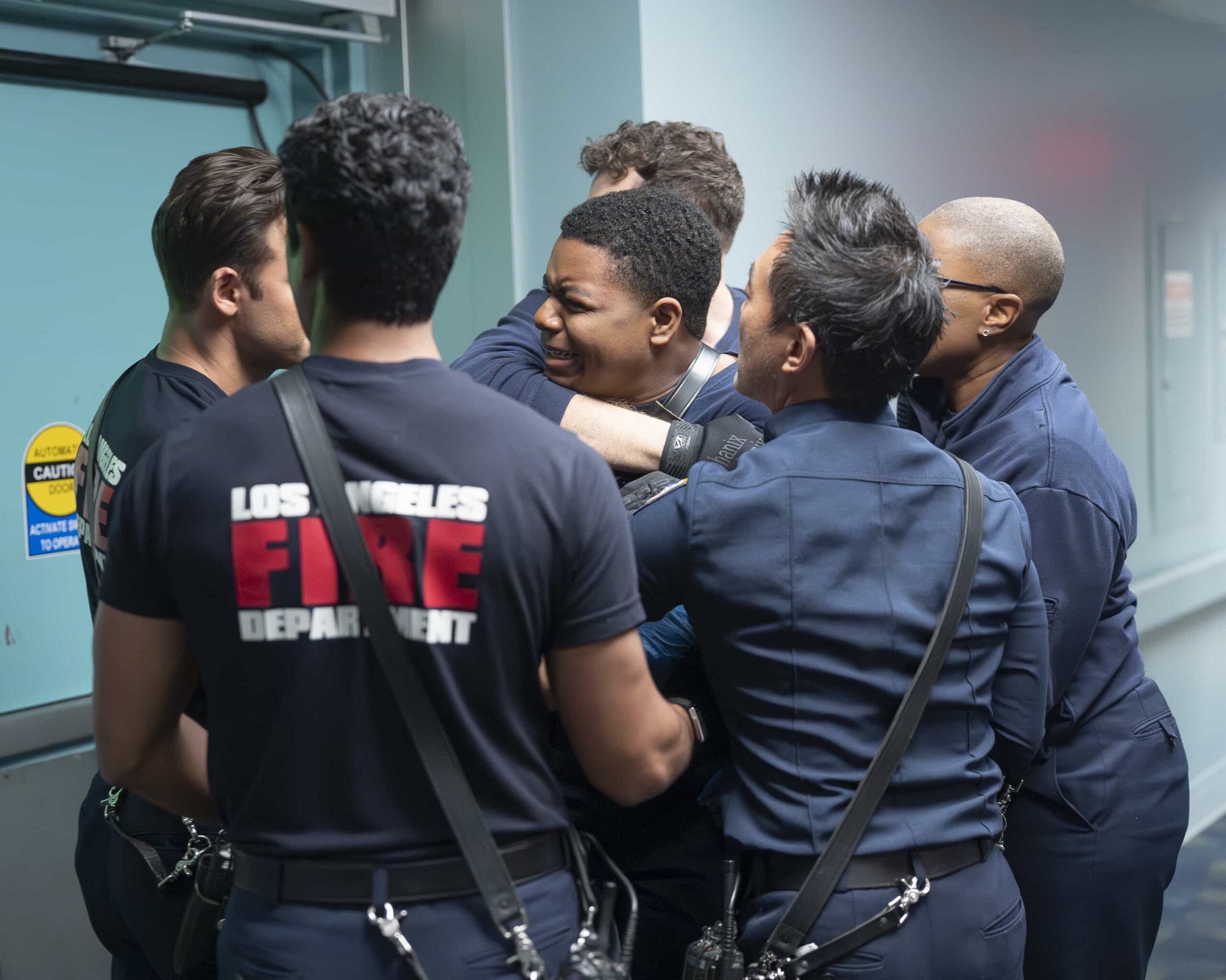9-1-1 - “Hearts and Flowers” - Following Athena’s shooting, the 118 gathers at the hospital awaiting news. Meanwhile, the mastermind behind the trafficking ring is determined to silence Athena and anyone who gets in his way for good. THURSDAY, MAY 7 (8:00-9:00 p.m. EDT) on ABC. (Disney/Christopher Willard) 
ELIJAH M. COOPER